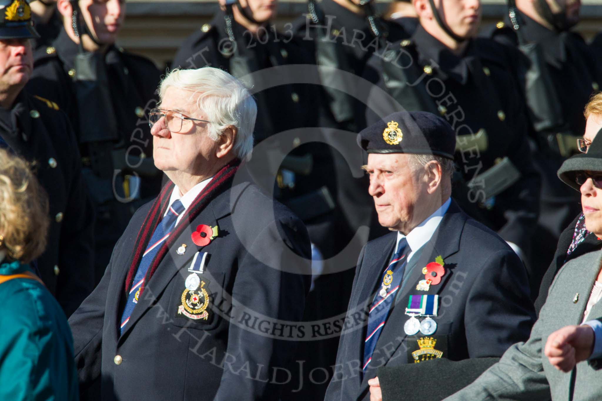 Remembrance Sunday at the Cenotaph in London 2014: Group E27 - Royal Naval Communications Association.
Press stand opposite the Foreign Office building, Whitehall, London SW1,
London,
Greater London,
United Kingdom,
on 09 November 2014 at 11:53, image #796