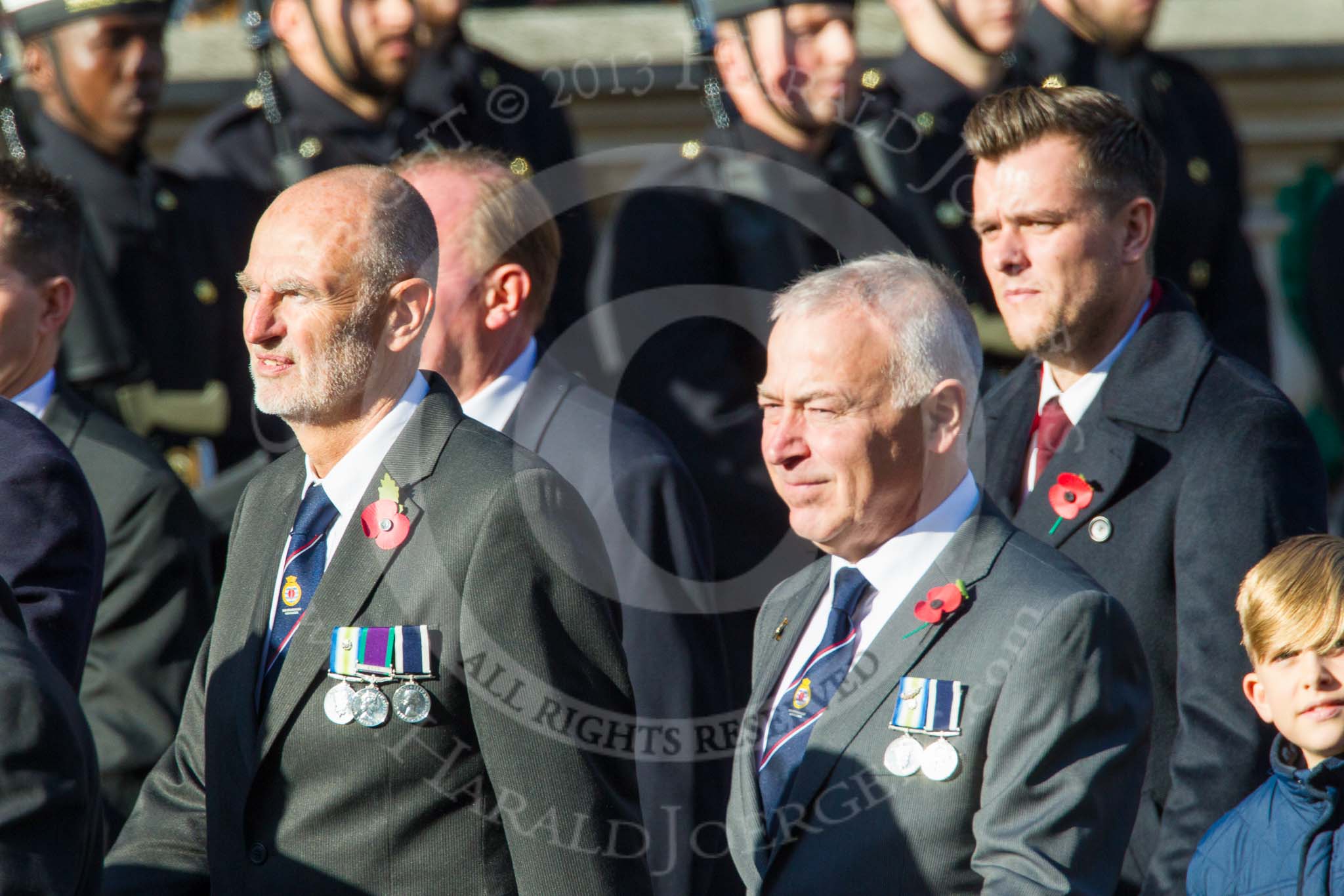 Remembrance Sunday at the Cenotaph in London 2014: Group E37 -Aircraft Handlers Association.
Press stand opposite the Foreign Office building, Whitehall, London SW1,
London,
Greater London,
United Kingdom,
on 09 November 2014 at 11:54, image #845