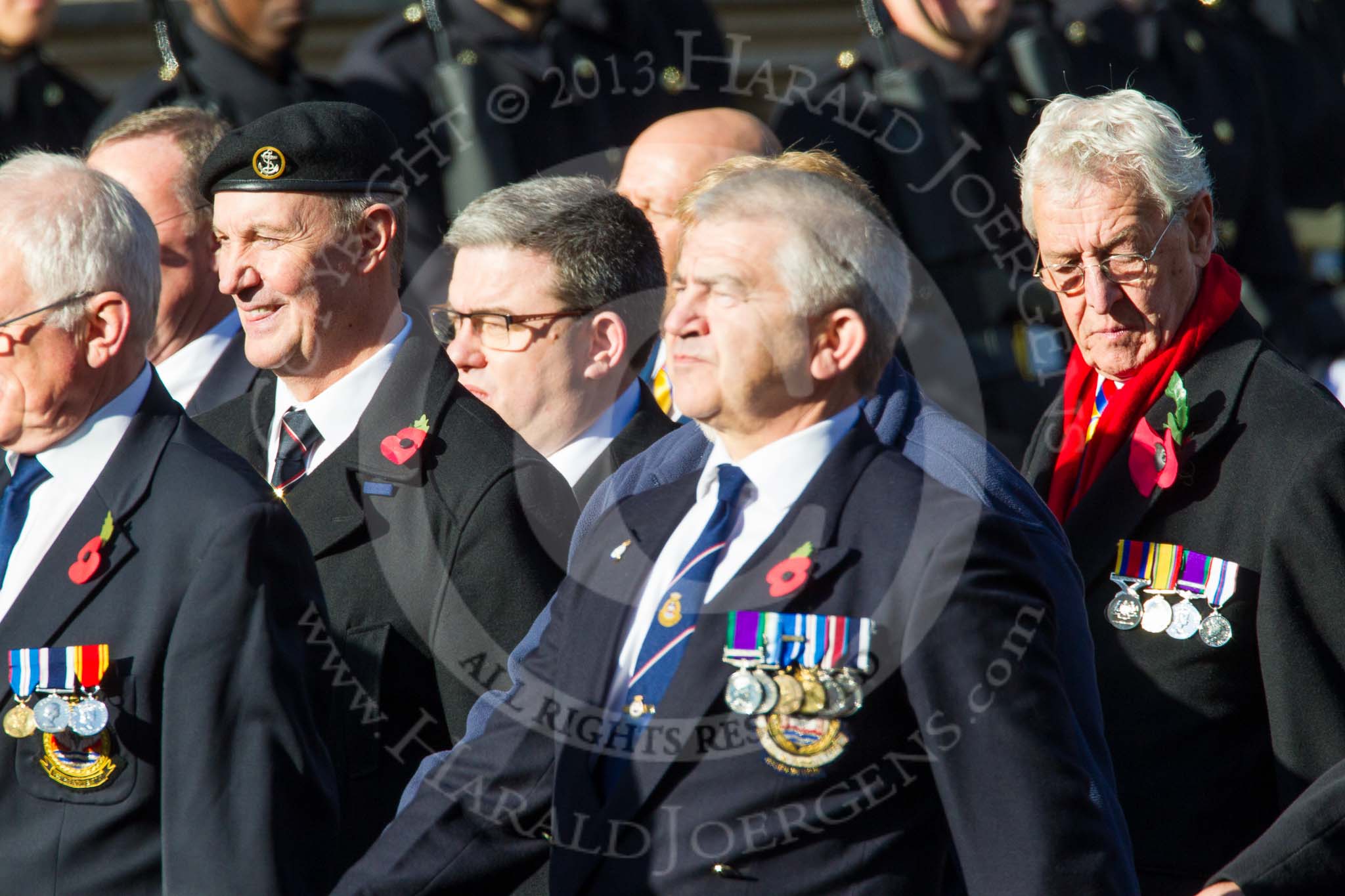 Remembrance Sunday at the Cenotaph in London 2014: Group E37 -Aircraft Handlers Association.
Press stand opposite the Foreign Office building, Whitehall, London SW1,
London,
Greater London,
United Kingdom,
on 09 November 2014 at 11:54, image #854