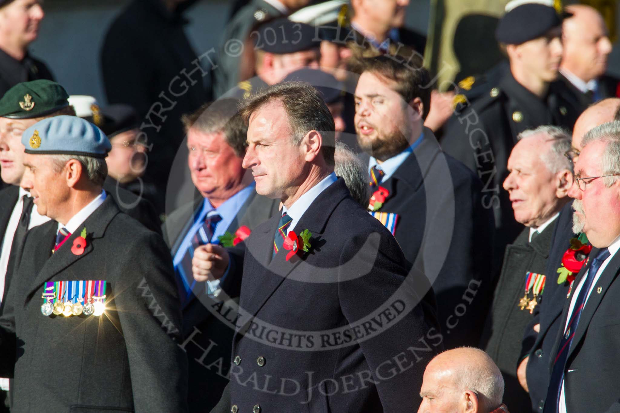 Remembrance Sunday at the Cenotaph in London 2014: ??? Please let me know which group this is! ???.
Press stand opposite the Foreign Office building, Whitehall, London SW1,
London,
Greater London,
United Kingdom,
on 09 November 2014 at 11:55, image #883