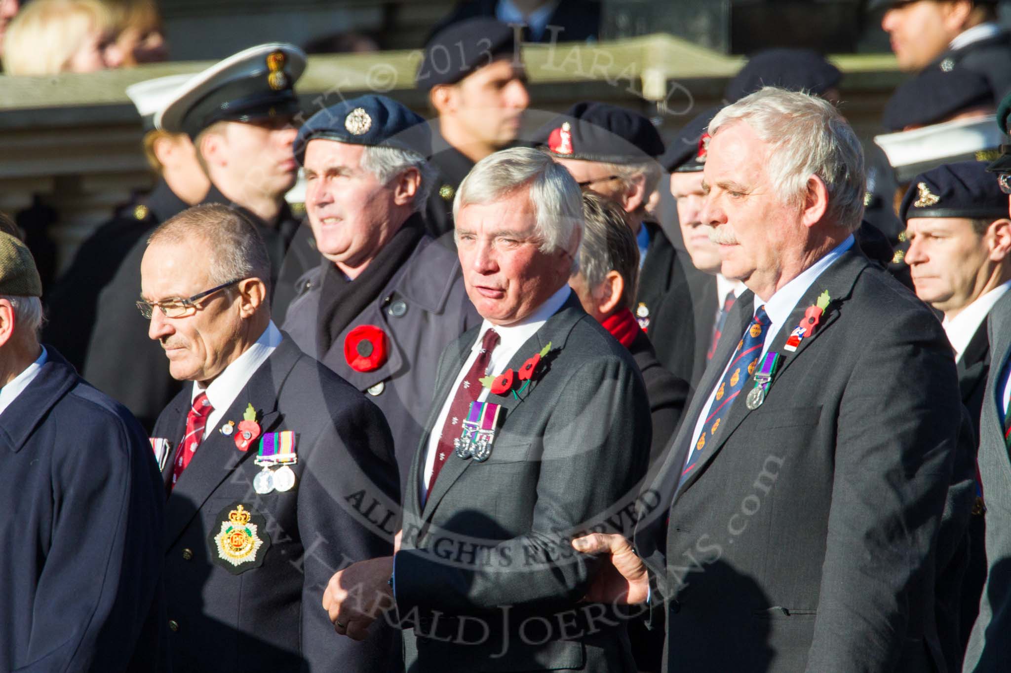 Remembrance Sunday at the Cenotaph in London 2014: ??? Please let me know which group this is! ???.
Press stand opposite the Foreign Office building, Whitehall, London SW1,
London,
Greater London,
United Kingdom,
on 09 November 2014 at 11:55, image #888