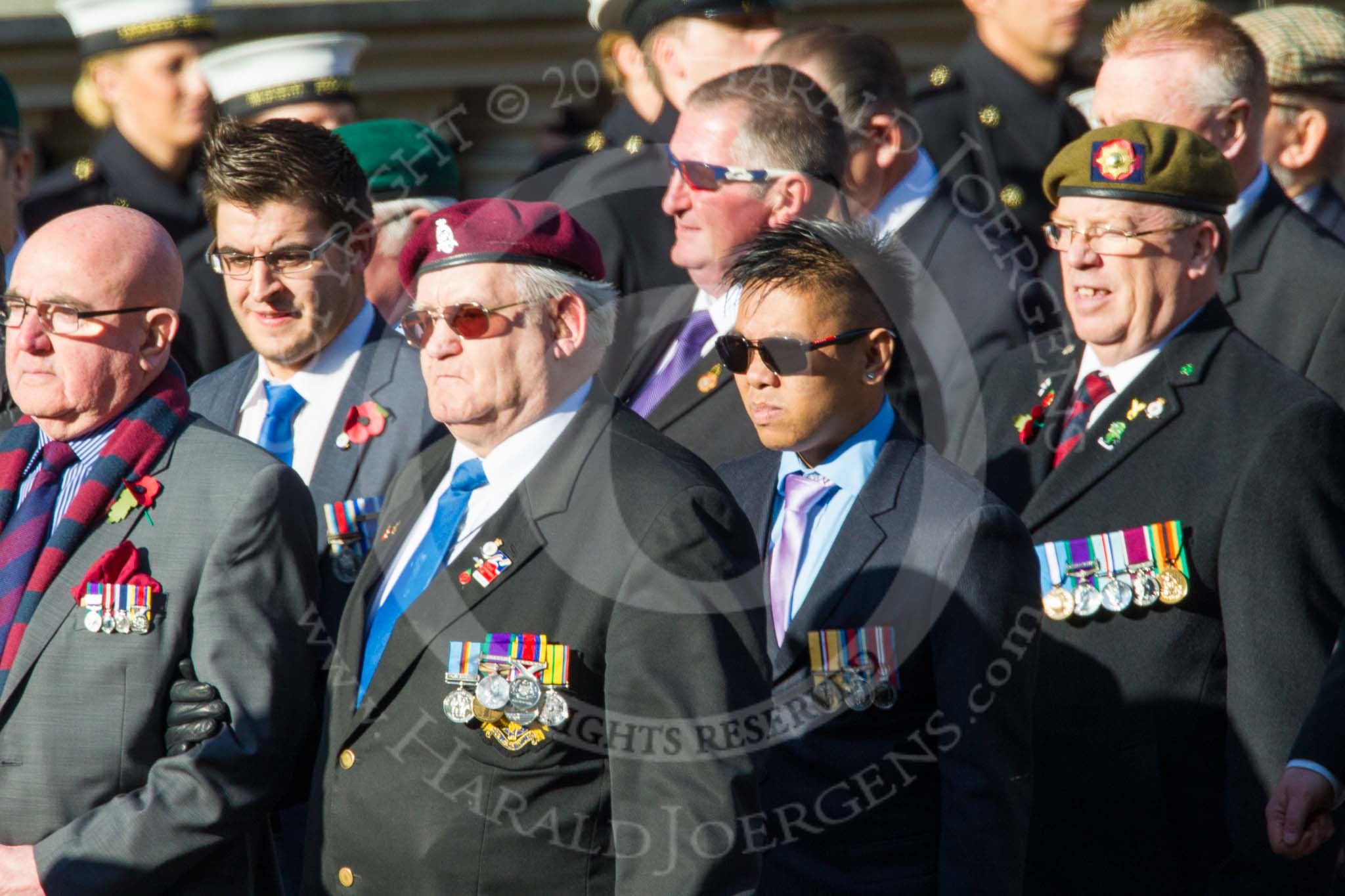 Remembrance Sunday at the Cenotaph in London 2014: ??? Please let me know which group this is! ???.
Press stand opposite the Foreign Office building, Whitehall, London SW1,
London,
Greater London,
United Kingdom,
on 09 November 2014 at 11:55, image #894
