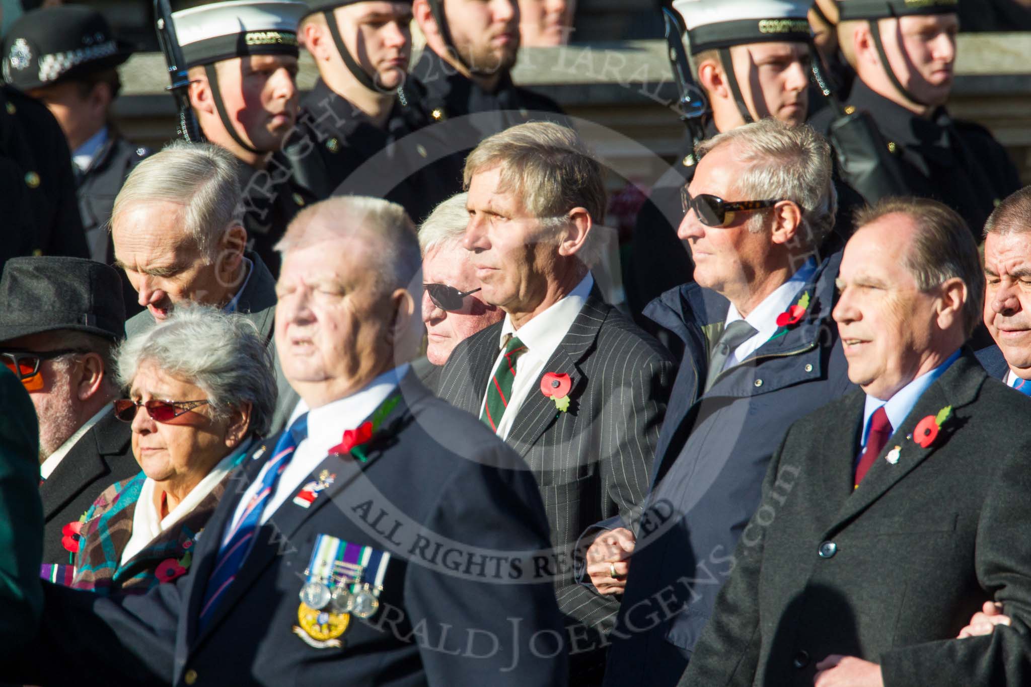 Remembrance Sunday at the Cenotaph in London 2014: Group A1 - Blind Veterans UK.
Press stand opposite the Foreign Office building, Whitehall, London SW1,
London,
Greater London,
United Kingdom,
on 09 November 2014 at 11:56, image #915