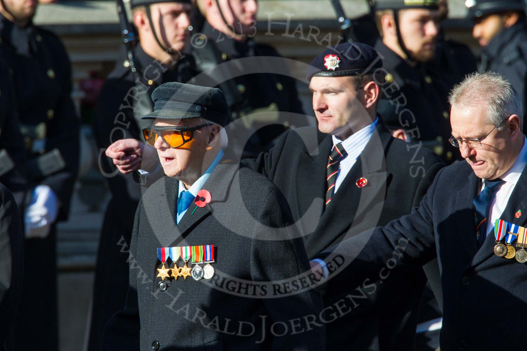 Remembrance Sunday at the Cenotaph in London 2014: Group A1 - Blind Veterans UK.
Press stand opposite the Foreign Office building, Whitehall, London SW1,
London,
Greater London,
United Kingdom,
on 09 November 2014 at 11:56, image #919