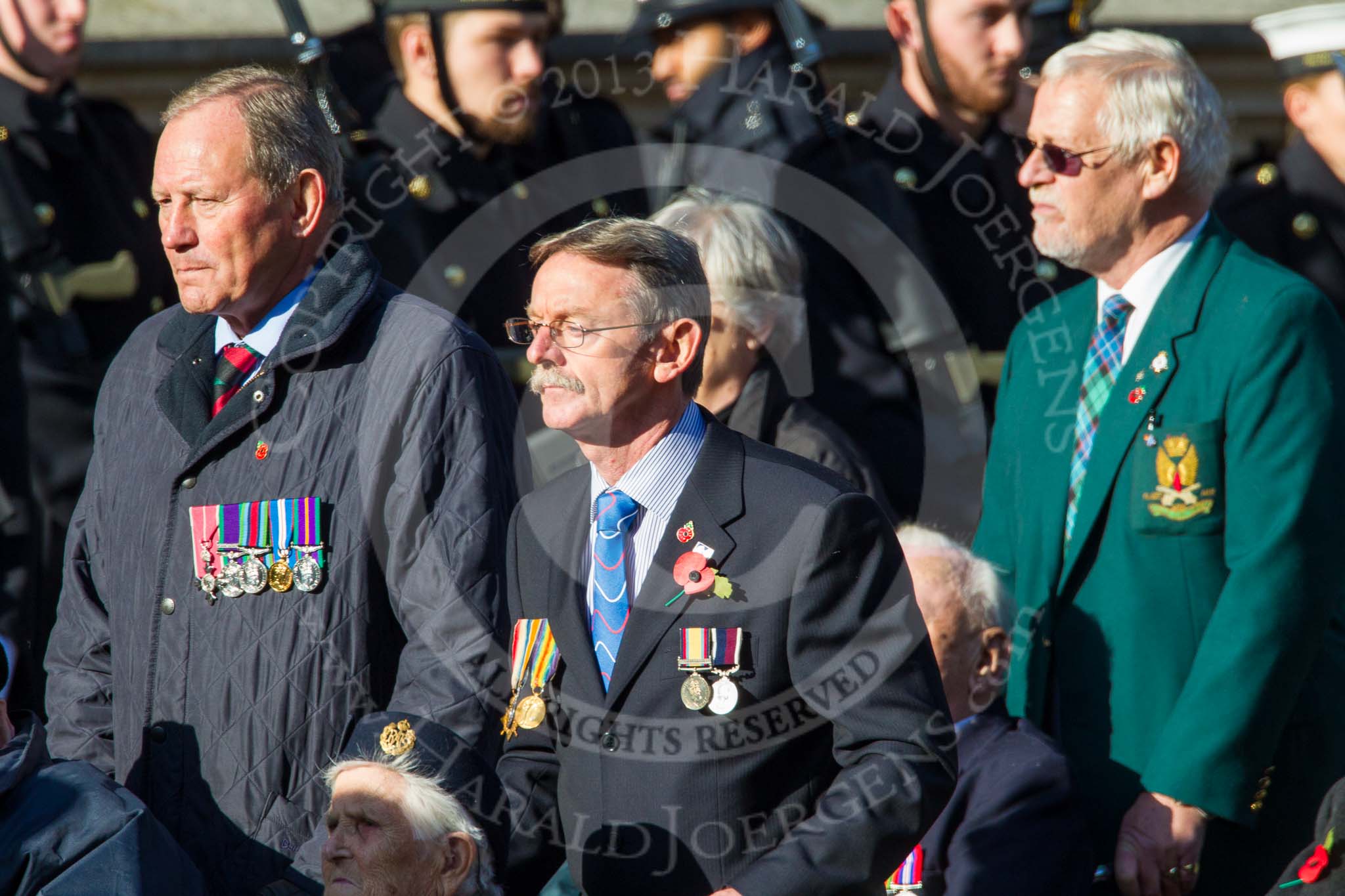Remembrance Sunday at the Cenotaph in London 2014: Group A1 - Blind Veterans UK.
Press stand opposite the Foreign Office building, Whitehall, London SW1,
London,
Greater London,
United Kingdom,
on 09 November 2014 at 11:56, image #922