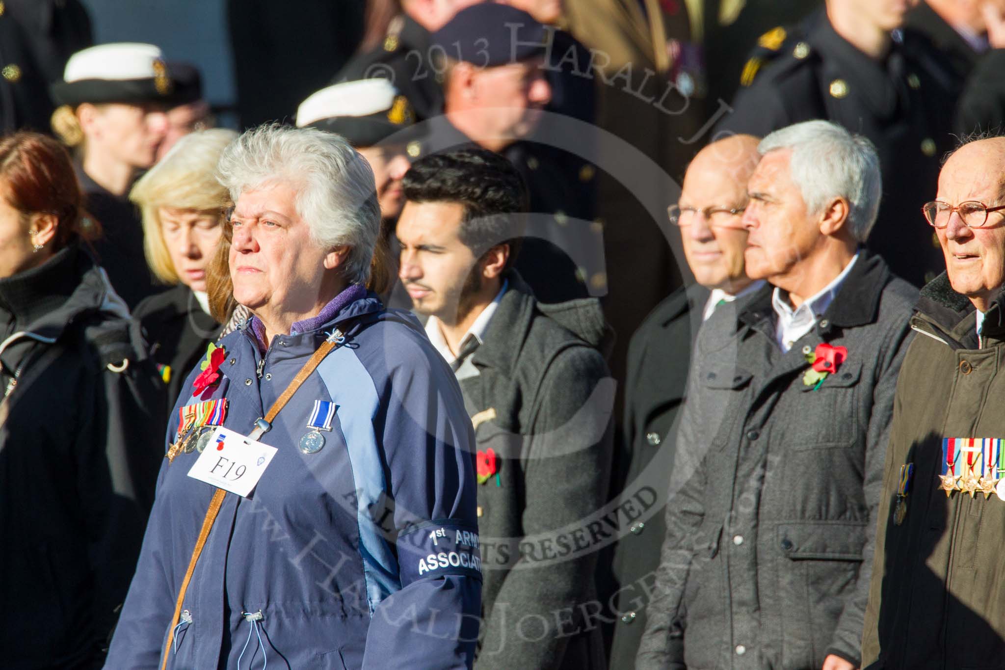 Remembrance Sunday at the Cenotaph in London 2014: Group F19 - 1st Army Association.
Press stand opposite the Foreign Office building, Whitehall, London SW1,
London,
Greater London,
United Kingdom,
on 09 November 2014 at 11:59, image #1088