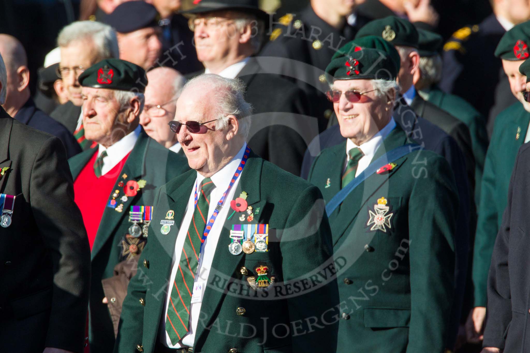 Remembrance Sunday at the Cenotaph in London 2014: Group A6 - King's Royal Rifle Corps Association.
Press stand opposite the Foreign Office building, Whitehall, London SW1,
London,
Greater London,
United Kingdom,
on 09 November 2014 at 12:00, image #1143
