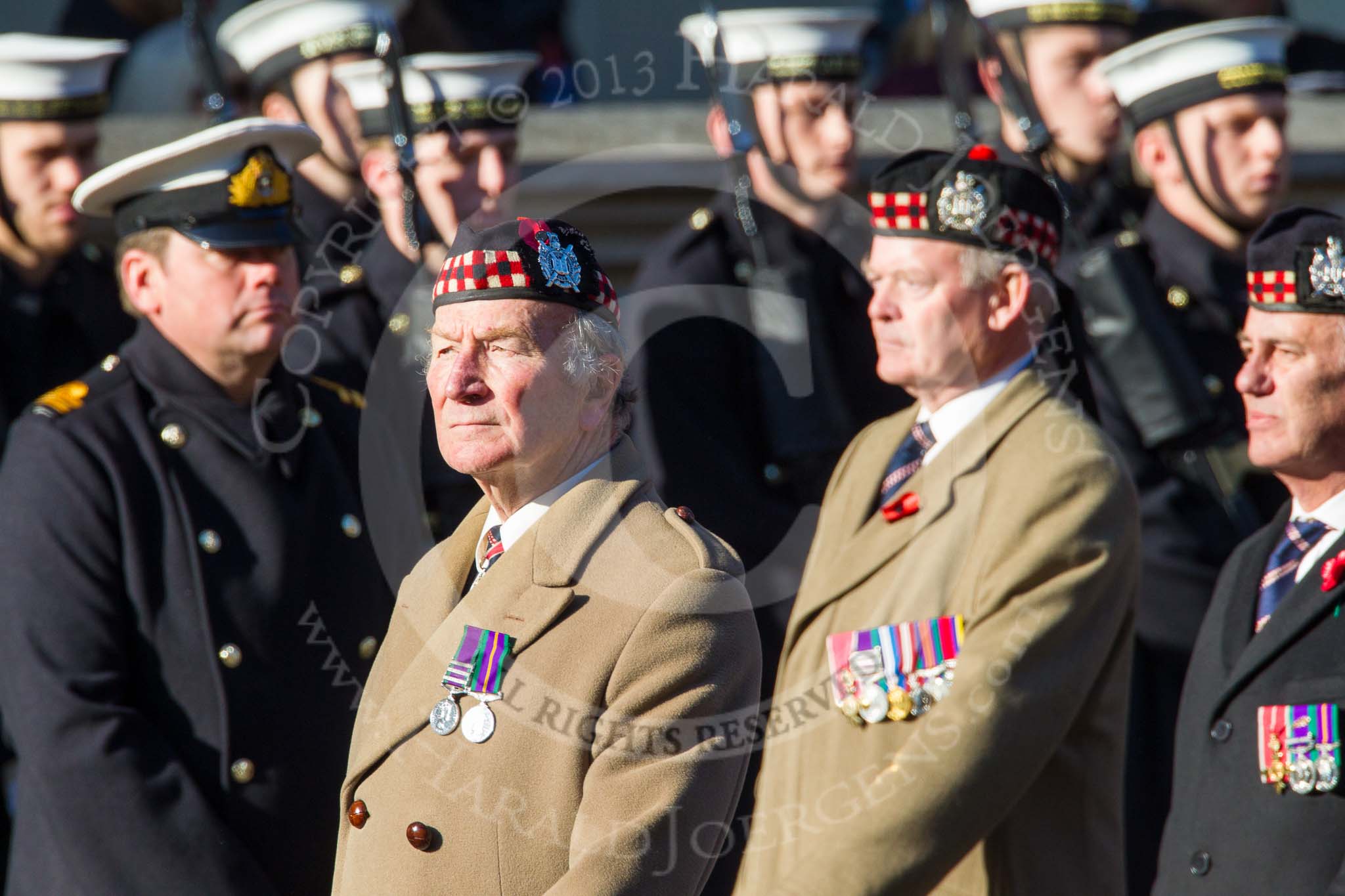 Remembrance Sunday at the Cenotaph in London 2014: Group A12 - King's Own Scottish Borderers.
Press stand opposite the Foreign Office building, Whitehall, London SW1,
London,
Greater London,
United Kingdom,
on 09 November 2014 at 12:02, image #1252