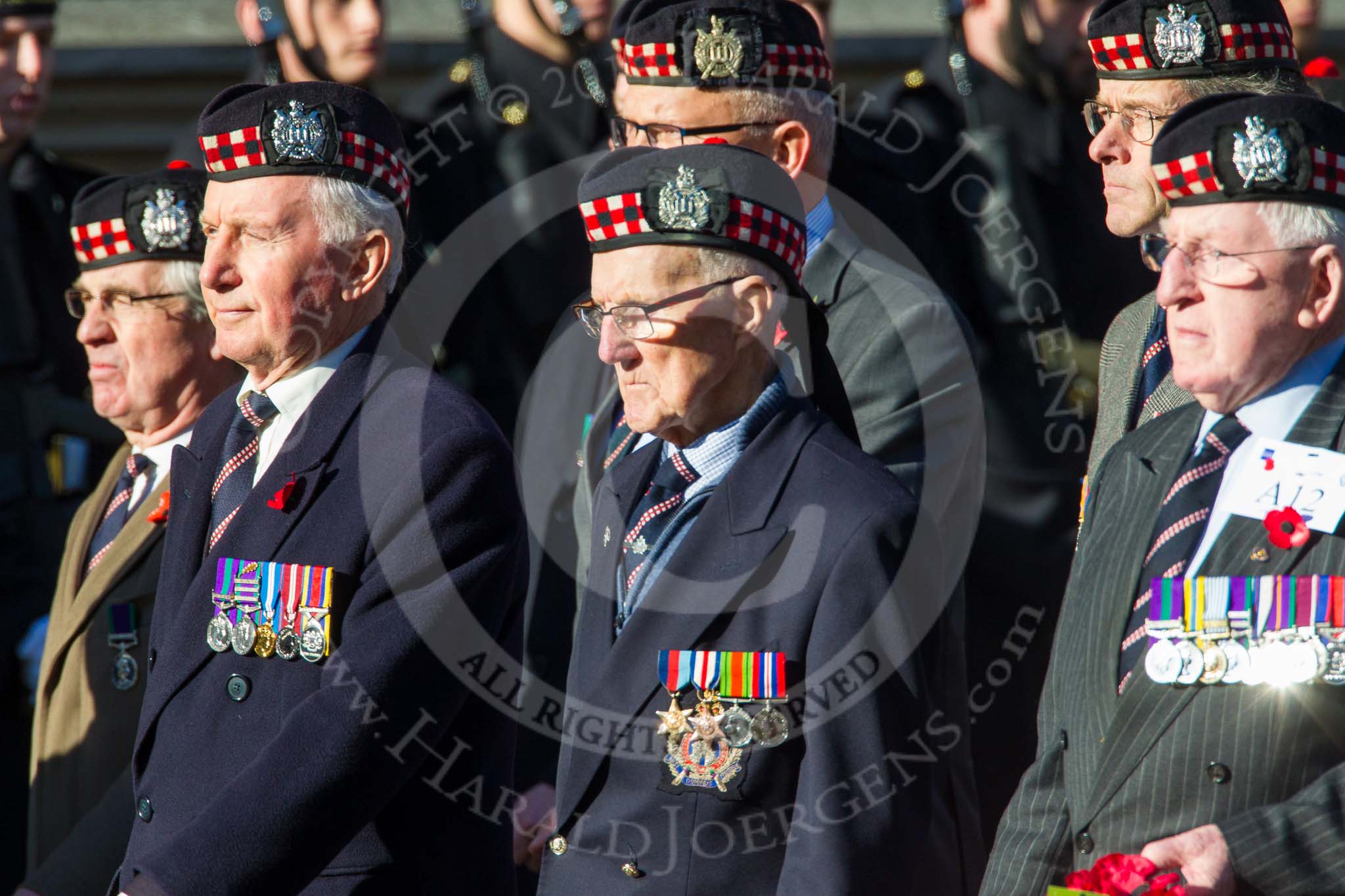 Remembrance Sunday at the Cenotaph in London 2014: Group A12 - King's Own Scottish Borderers.
Press stand opposite the Foreign Office building, Whitehall, London SW1,
London,
Greater London,
United Kingdom,
on 09 November 2014 at 12:02, image #1255