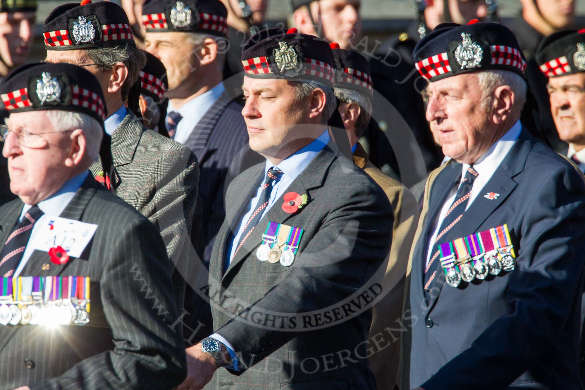 Remembrance Sunday at the Cenotaph in London 2014: Group A12 - King's Own Scottish Borderers.
Press stand opposite the Foreign Office building, Whitehall, London SW1,
London,
Greater London,
United Kingdom,
on 09 November 2014 at 12:02, image #1257