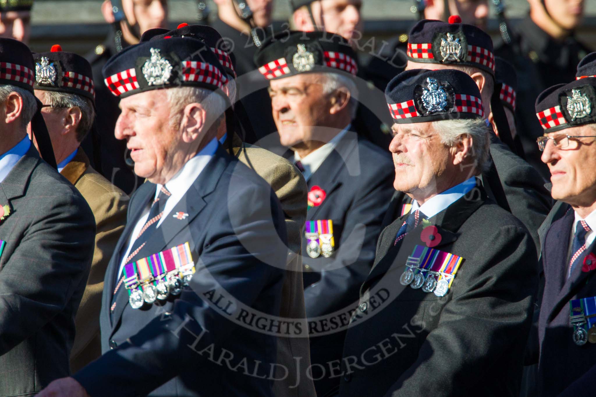 Remembrance Sunday at the Cenotaph in London 2014: Group A12 - King's Own Scottish Borderers.
Press stand opposite the Foreign Office building, Whitehall, London SW1,
London,
Greater London,
United Kingdom,
on 09 November 2014 at 12:02, image #1258