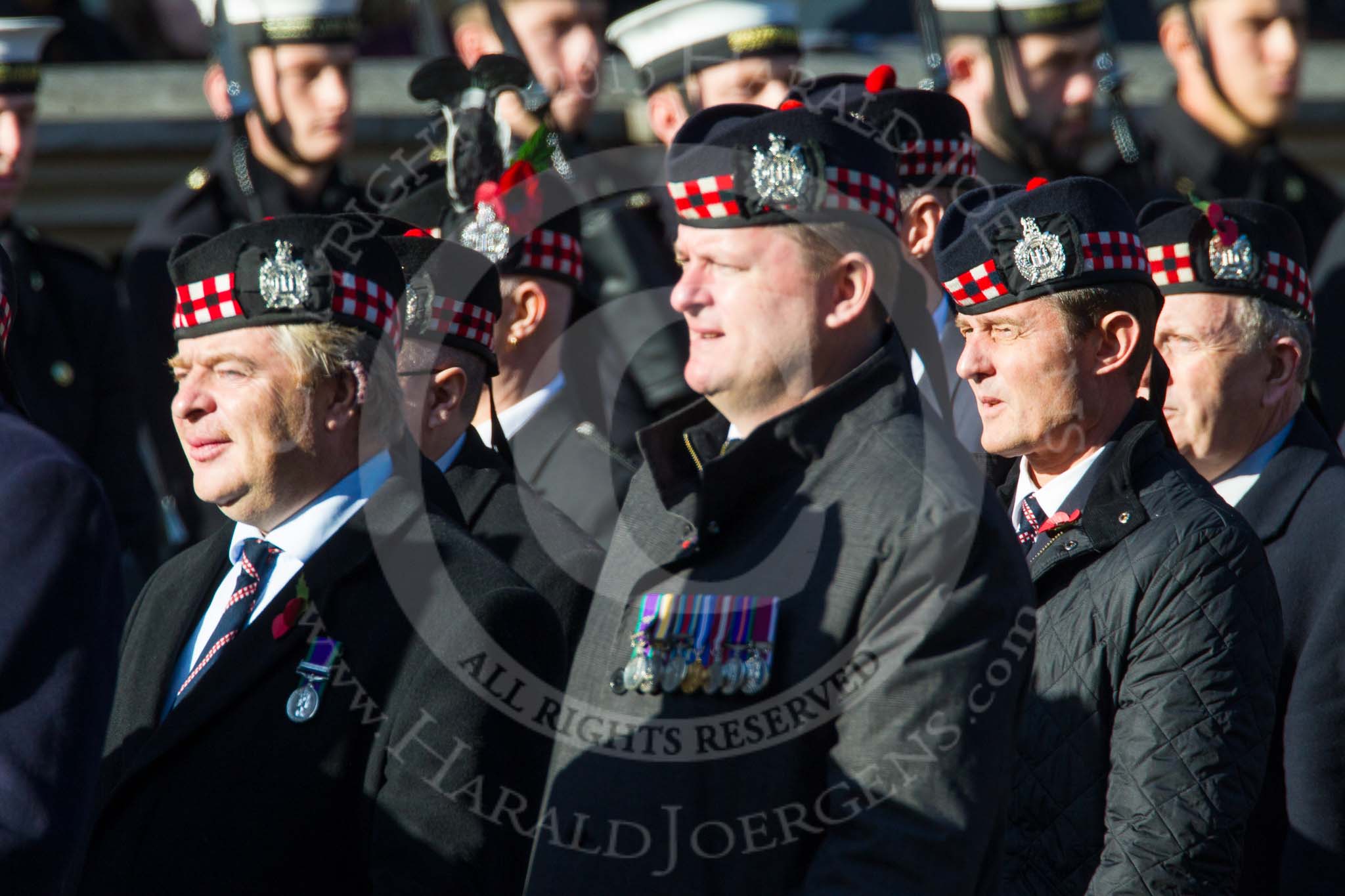 Remembrance Sunday at the Cenotaph in London 2014: Group A12 - King's Own Scottish Borderers.
Press stand opposite the Foreign Office building, Whitehall, London SW1,
London,
Greater London,
United Kingdom,
on 09 November 2014 at 12:02, image #1262