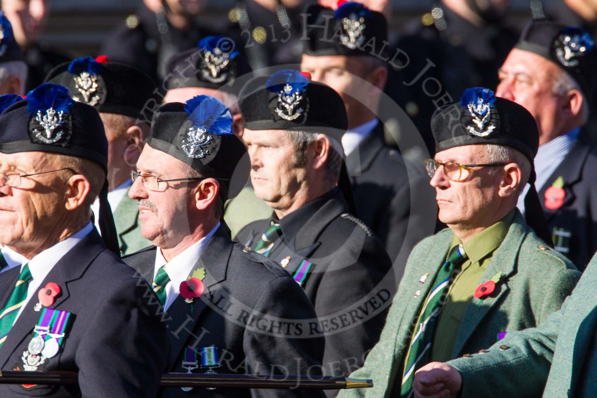 Remembrance Sunday at the Cenotaph in London 2014: Group A35 - Queen's Own Highlanders Regimental Association.
Press stand opposite the Foreign Office building, Whitehall, London SW1,
London,
Greater London,
United Kingdom,
on 09 November 2014 at 12:06, image #1461