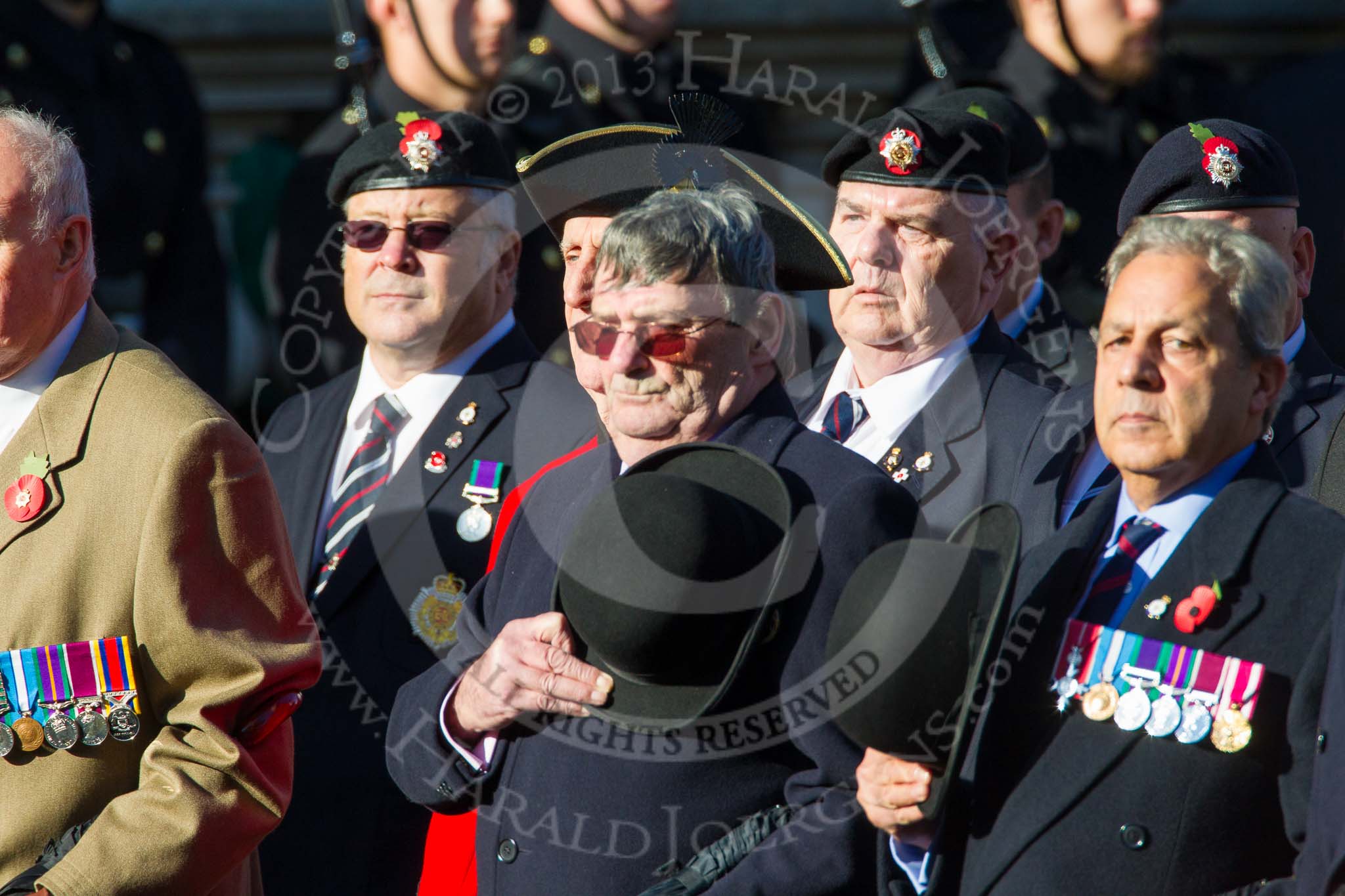 Remembrance Sunday at the Cenotaph in London 2014: Group B13 - Royal Army Service Corps & Royal Corps of Transport Association.
Press stand opposite the Foreign Office building, Whitehall, London SW1,
London,
Greater London,
United Kingdom,
on 09 November 2014 at 12:09, image #1642