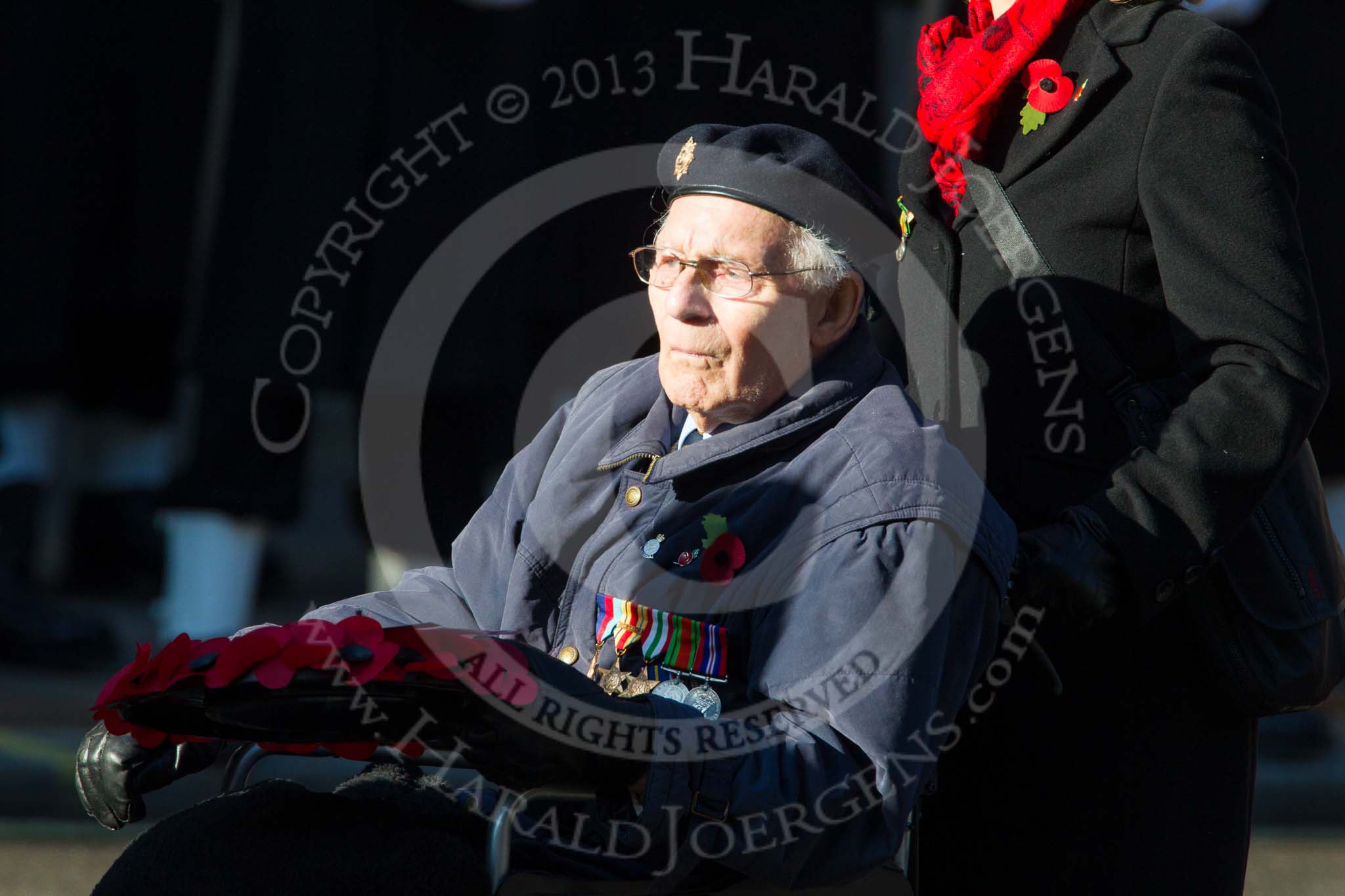 Remembrance Sunday at the Cenotaph in London 2014: Group B13 - Royal Army Service Corps & Royal Corps of Transport Association.
Press stand opposite the Foreign Office building, Whitehall, London SW1,
London,
Greater London,
United Kingdom,
on 09 November 2014 at 12:09, image #1651