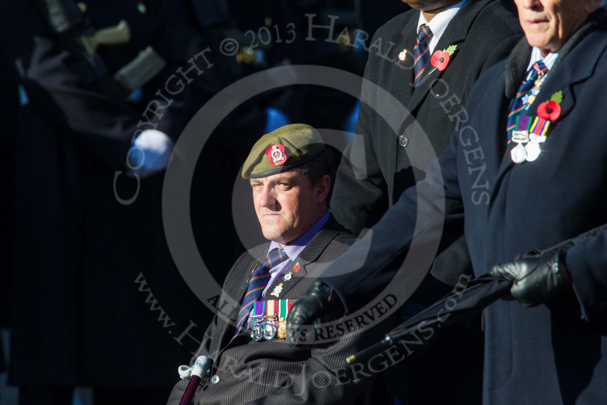 Remembrance Sunday at the Cenotaph in London 2014: Group B16 - Royal Pioneer Corps Association.
Press stand opposite the Foreign Office building, Whitehall, London SW1,
London,
Greater London,
United Kingdom,
on 09 November 2014 at 12:09, image #1672