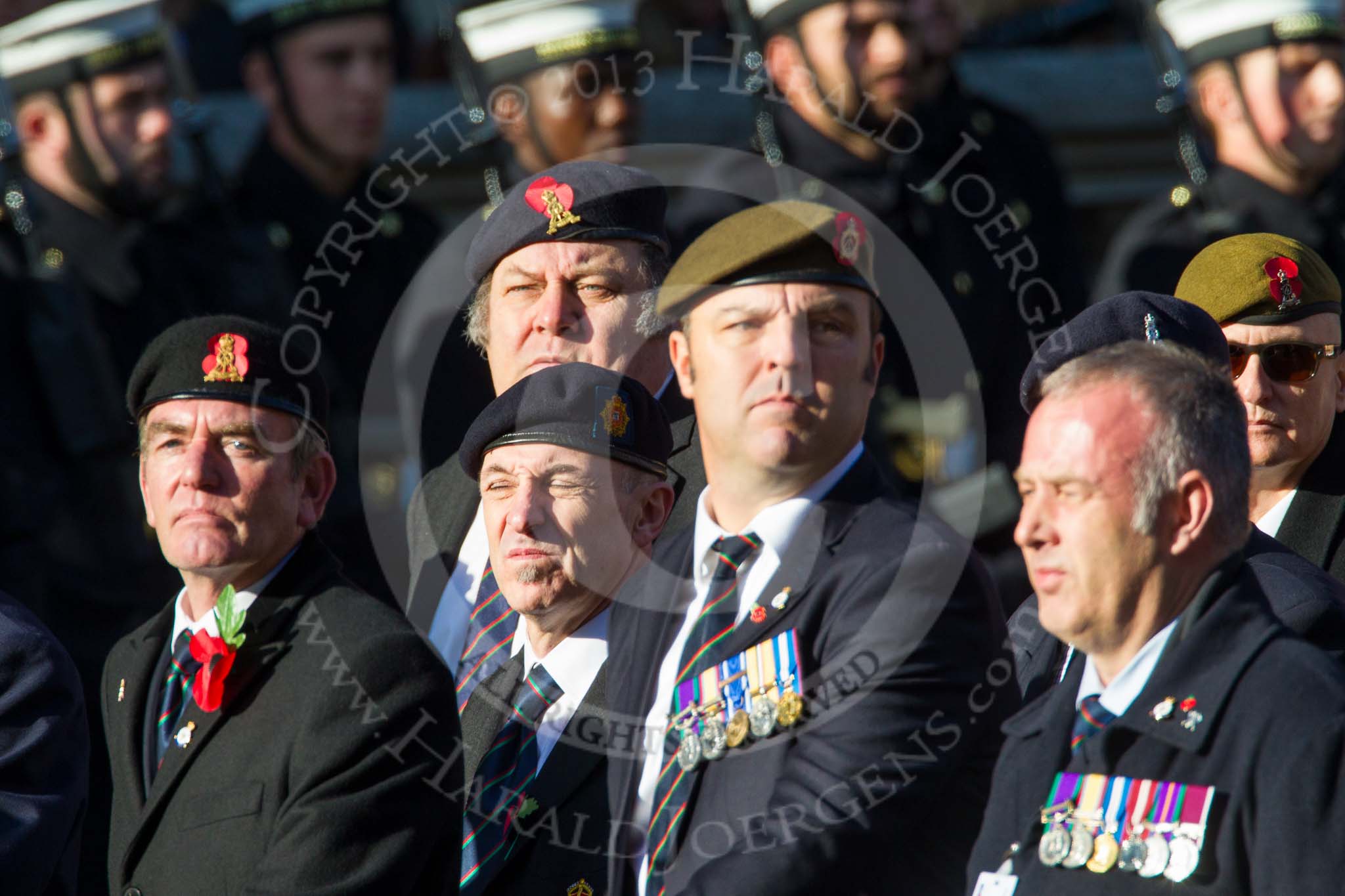 Remembrance Sunday at the Cenotaph in London 2014: Group B16 - Royal Pioneer Corps Association.
Press stand opposite the Foreign Office building, Whitehall, London SW1,
London,
Greater London,
United Kingdom,
on 09 November 2014 at 12:09, image #1677