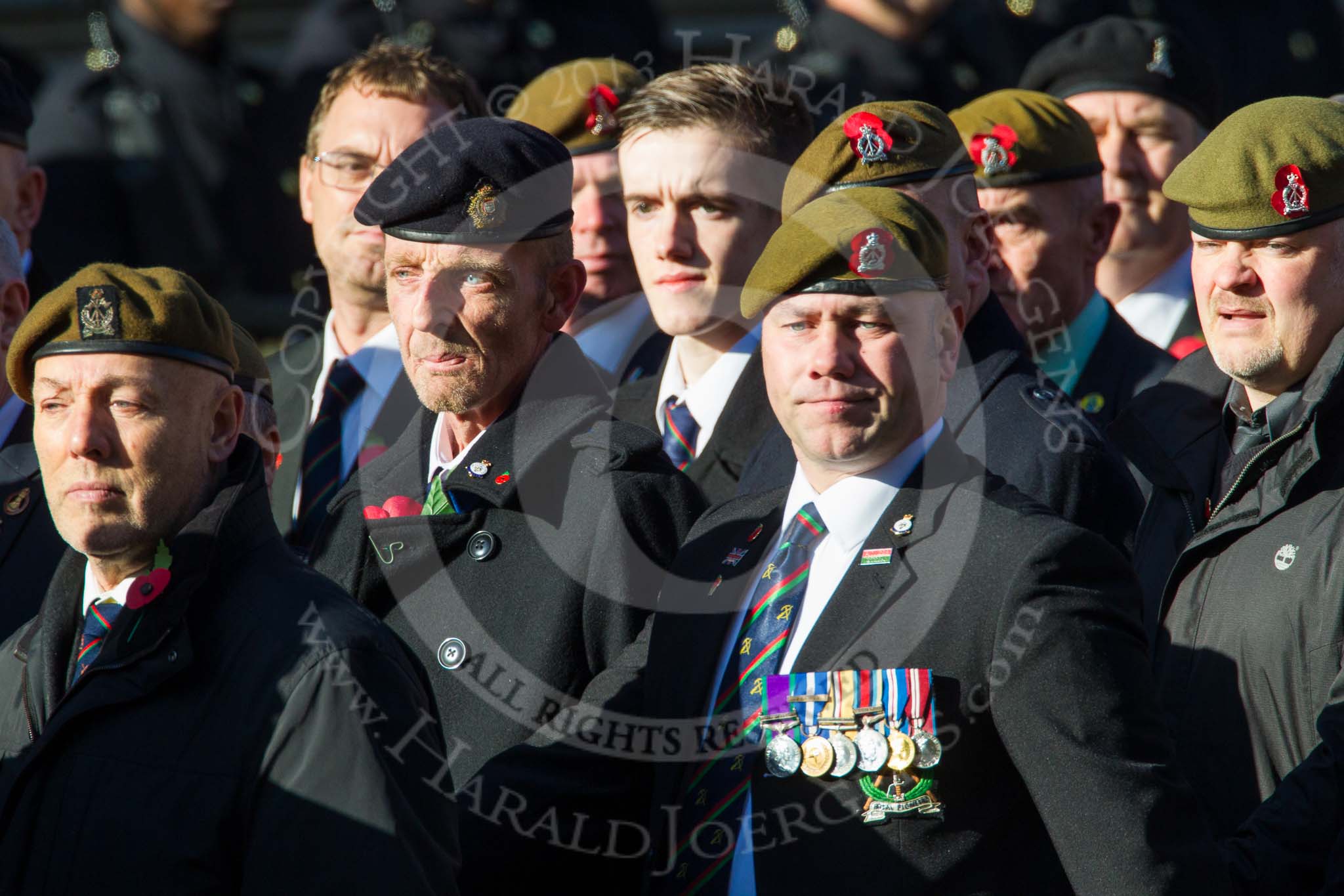 Remembrance Sunday at the Cenotaph in London 2014: Group B16 - Royal Pioneer Corps Association.
Press stand opposite the Foreign Office building, Whitehall, London SW1,
London,
Greater London,
United Kingdom,
on 09 November 2014 at 12:09, image #1682