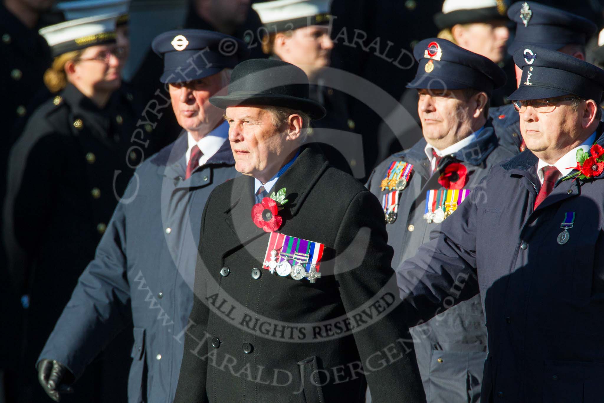 Remembrance Sunday at the Cenotaph in London 2014: Group M1 - Transport For London.
Press stand opposite the Foreign Office building, Whitehall, London SW1,
London,
Greater London,
United Kingdom,
on 09 November 2014 at 12:14, image #1959