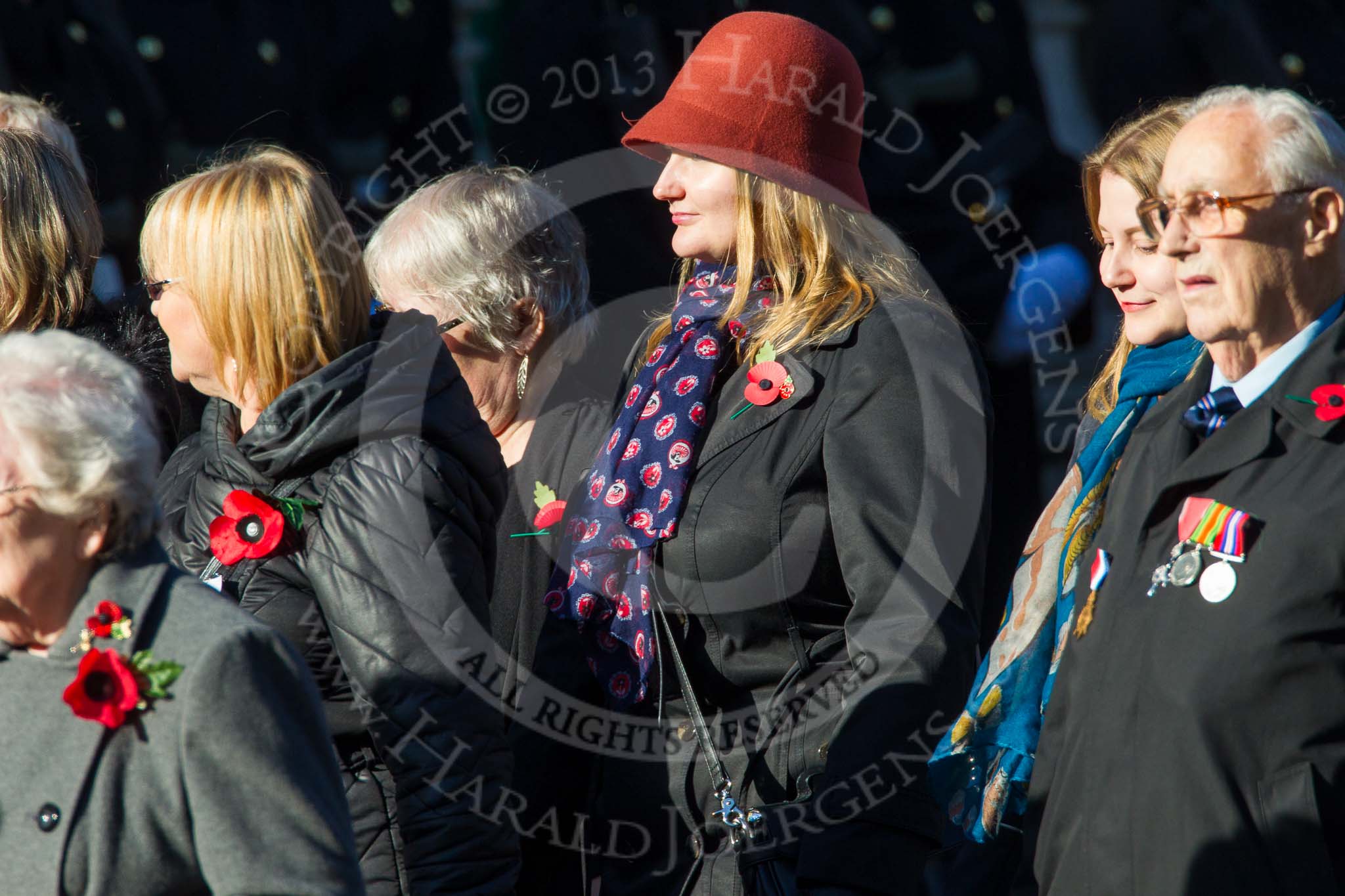 Remembrance Sunday at the Cenotaph in London 2014: Group M3 - Munitions Workers Association.
Press stand opposite the Foreign Office building, Whitehall, London SW1,
London,
Greater London,
United Kingdom,
on 09 November 2014 at 12:15, image #1984