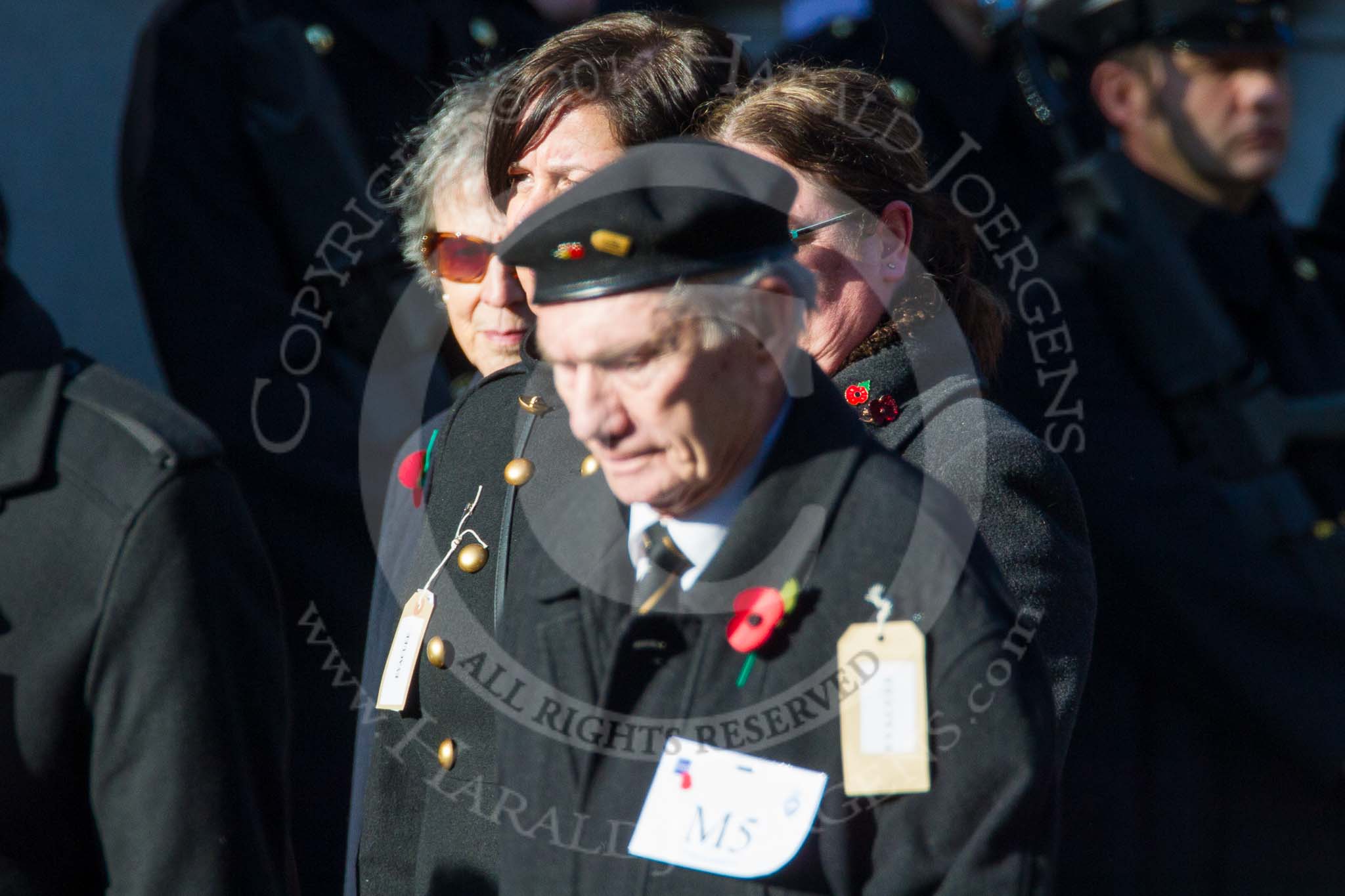 Remembrance Sunday at the Cenotaph in London 2014: Group M5 - Evacuees Reunion Association.
Press stand opposite the Foreign Office building, Whitehall, London SW1,
London,
Greater London,
United Kingdom,
on 09 November 2014 at 12:15, image #2008