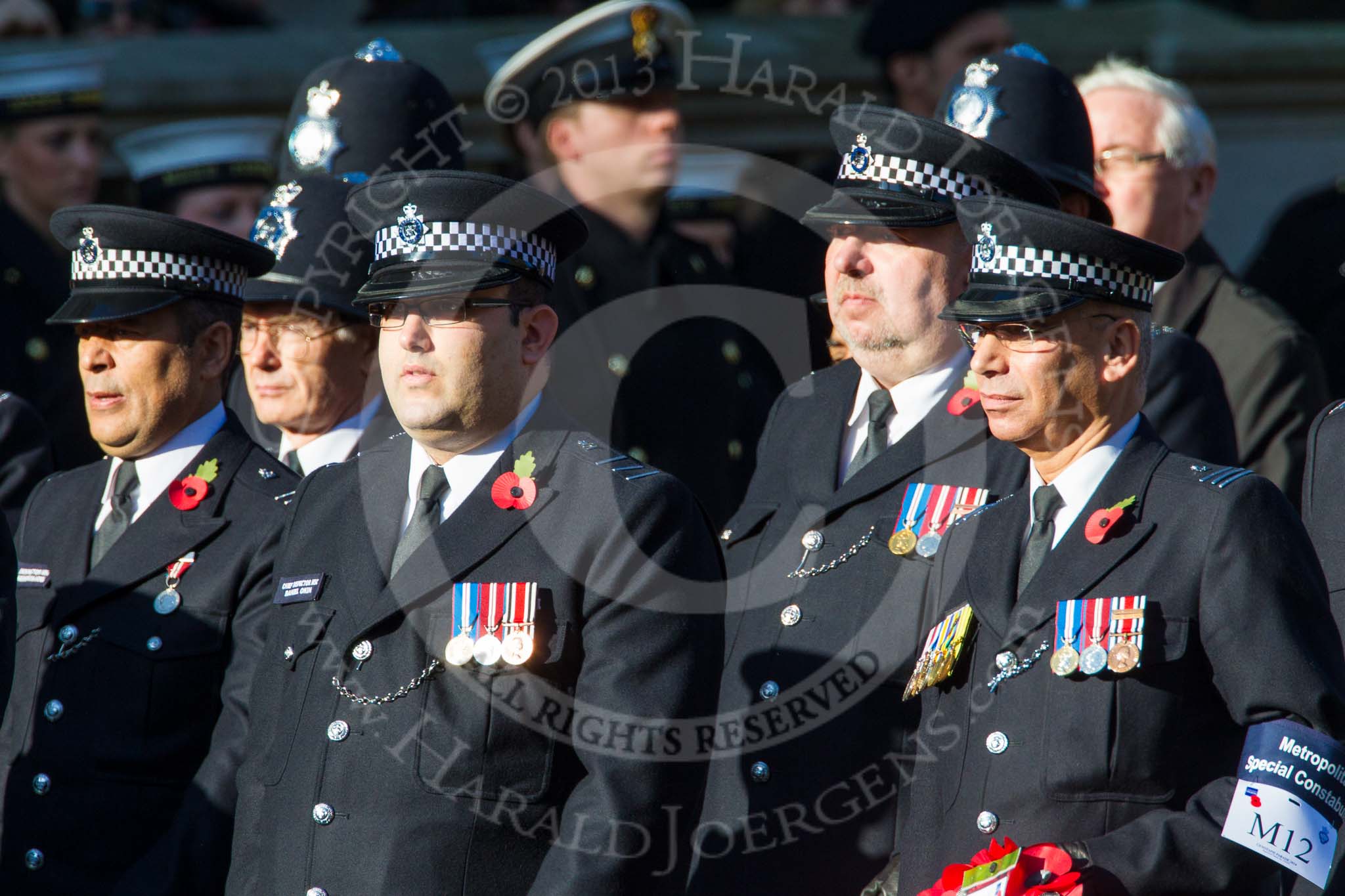 Remembrance Sunday at the Cenotaph in London 2014: Group M12 - Metropolitan Special Constabulary.
Press stand opposite the Foreign Office building, Whitehall, London SW1,
London,
Greater London,
United Kingdom,
on 09 November 2014 at 12:16, image #2061