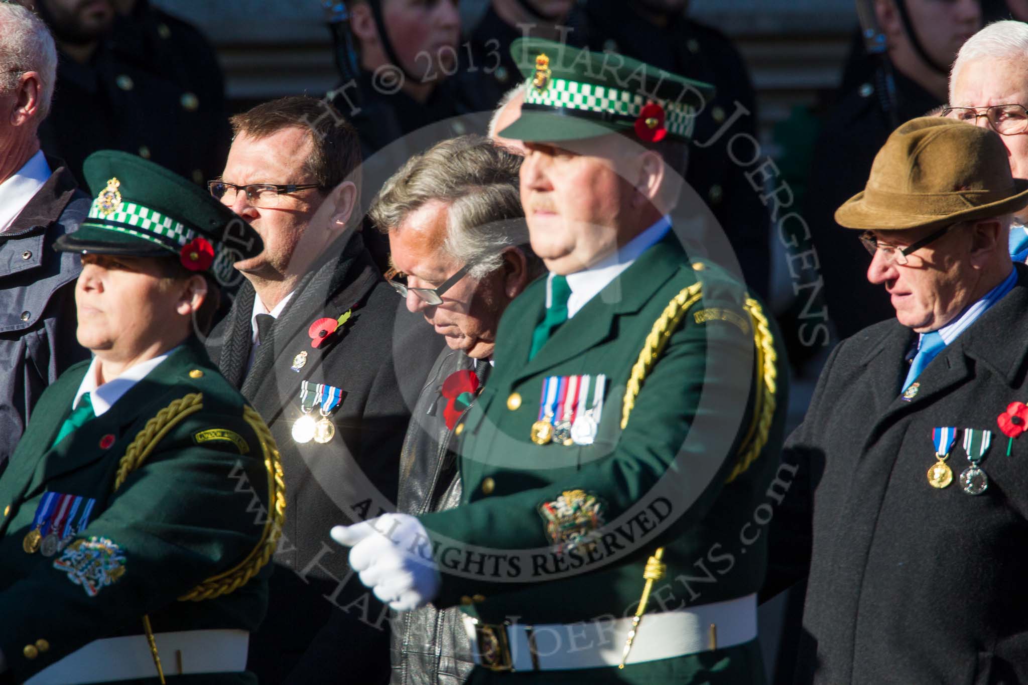 Remembrance Sunday at the Cenotaph in London 2014: Group M13 - London Ambulance Service NHS Trust.
Press stand opposite the Foreign Office building, Whitehall, London SW1,
London,
Greater London,
United Kingdom,
on 09 November 2014 at 12:16, image #2078