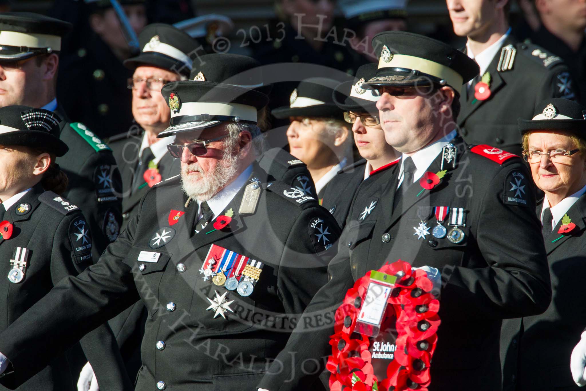 Remembrance Sunday at the Cenotaph in London 2014: Group M15 - St John Ambulance.
Press stand opposite the Foreign Office building, Whitehall, London SW1,
London,
Greater London,
United Kingdom,
on 09 November 2014 at 12:16, image #2087