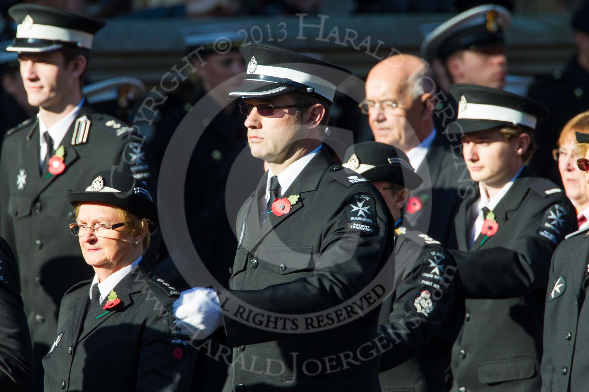 Remembrance Sunday at the Cenotaph in London 2014: Group M15 - St John Ambulance.
Press stand opposite the Foreign Office building, Whitehall, London SW1,
London,
Greater London,
United Kingdom,
on 09 November 2014 at 12:16, image #2089
