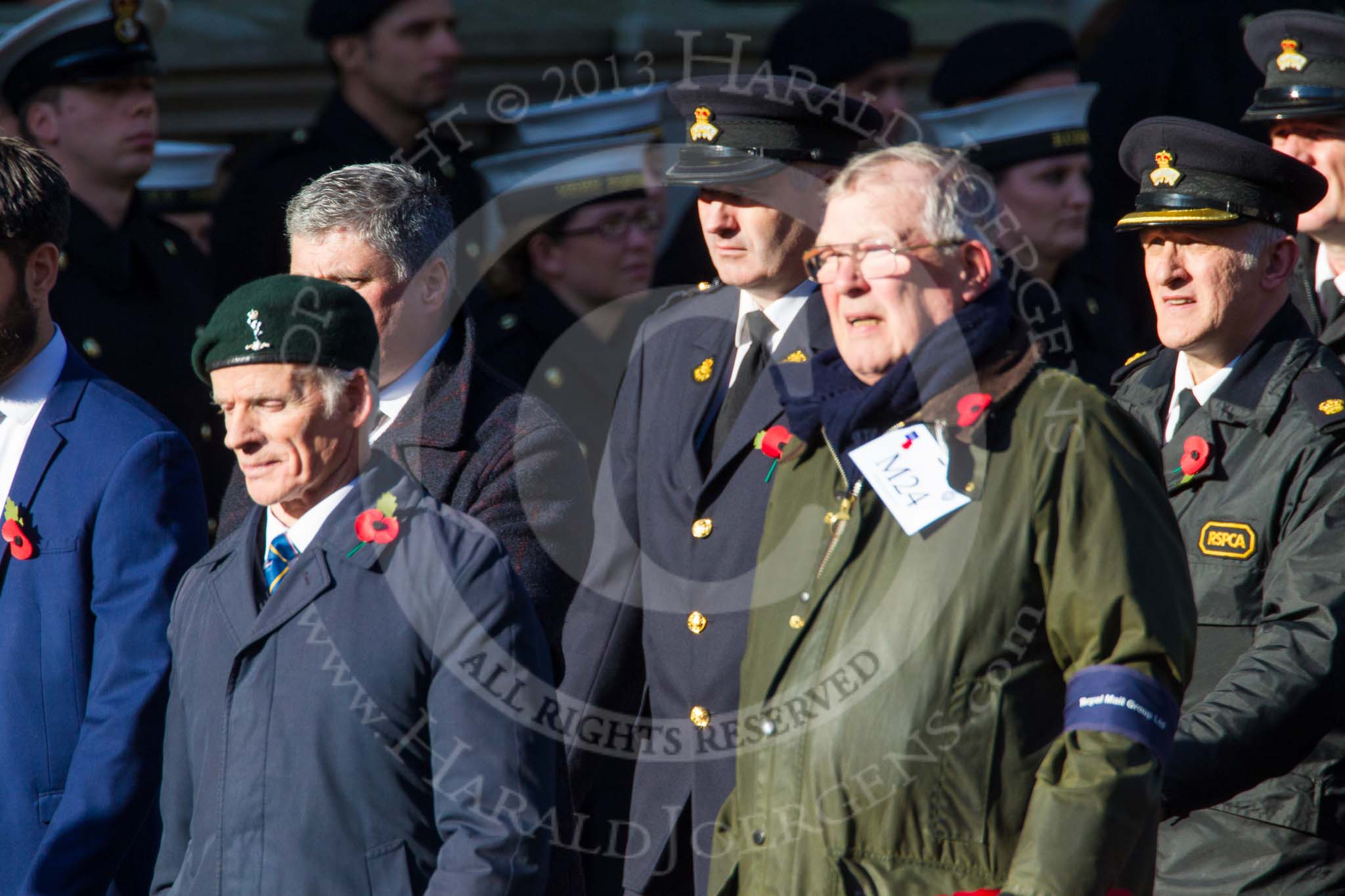 Remembrance Sunday at the Cenotaph in London 2014: Group M24 - Royal Mail Group Ltd.
Press stand opposite the Foreign Office building, Whitehall, London SW1,
London,
Greater London,
United Kingdom,
on 09 November 2014 at 12:18, image #2185