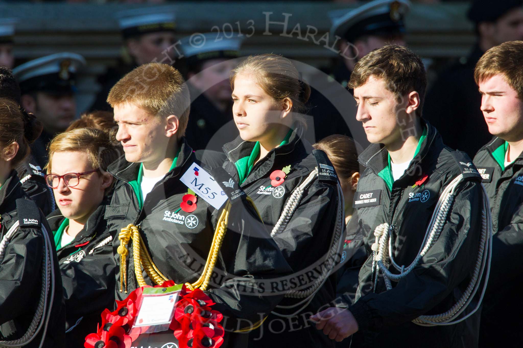 Remembrance Sunday at the Cenotaph in London 2014: Group M55 - St John Ambulance Cadets.
Press stand opposite the Foreign Office building, Whitehall, London SW1,
London,
Greater London,
United Kingdom,
on 09 November 2014 at 12:22, image #2363