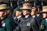 Remembrance Sunday at the Cenotaph in London 2014: Group D25 - Gurkha Brigade Association.
Press stand opposite the Foreign Office building, Whitehall, London SW1,
London,
Greater London,
United Kingdom,
on 09 November 2014 at 11:47, image #469