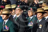 Remembrance Sunday at the Cenotaph in London 2014: Group D26 - British Gurkha Welfare Society.
Press stand opposite the Foreign Office building, Whitehall, London SW1,
London,
Greater London,
United Kingdom,
on 09 November 2014 at 11:47, image #484
