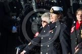 Remembrance Sunday at the Cenotaph in London 2014: Group E24 - Queen Alexandra's Royal Naval Nursing Service.
Press stand opposite the Foreign Office building, Whitehall, London SW1,
London,
Greater London,
United Kingdom,
on 09 November 2014 at 11:52, image #749