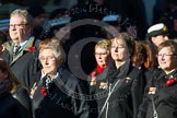 Remembrance Sunday at the Cenotaph in London 2014: Group M23 - Civilians Representing Families.
Press stand opposite the Foreign Office building, Whitehall, London SW1,
London,
Greater London,
United Kingdom,
on 09 November 2014 at 12:18, image #2161