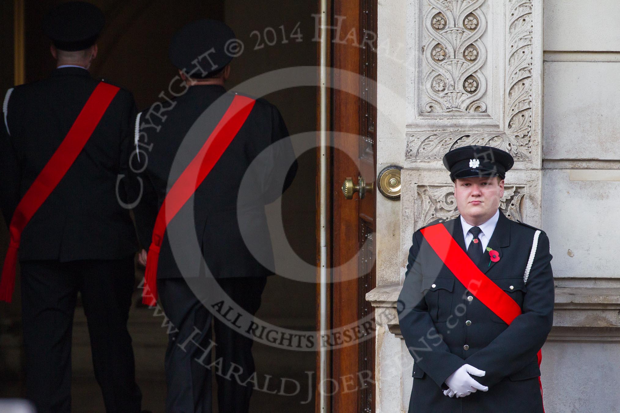 Remembrance Sunday at the Cenotaph in London 2014: Preparations for the event - guarding the entrance of the Foreign- and Commonwealth Office building..
Press stand opposite the Foreign Office building, Whitehall, London SW1,
London,
Greater London,
United Kingdom,
on 09 November 2014 at 08:21, image #7