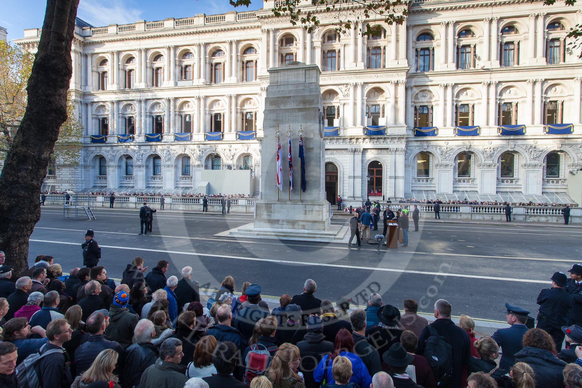 Remembrance Sunday at the Cenotaph in London 2014: 8:50am, Whitehall is already crowded..
Press stand opposite the Foreign Office building, Whitehall, London SW1,
London,
Greater London,
United Kingdom,
on 09 November 2014 at 08:50, image #12