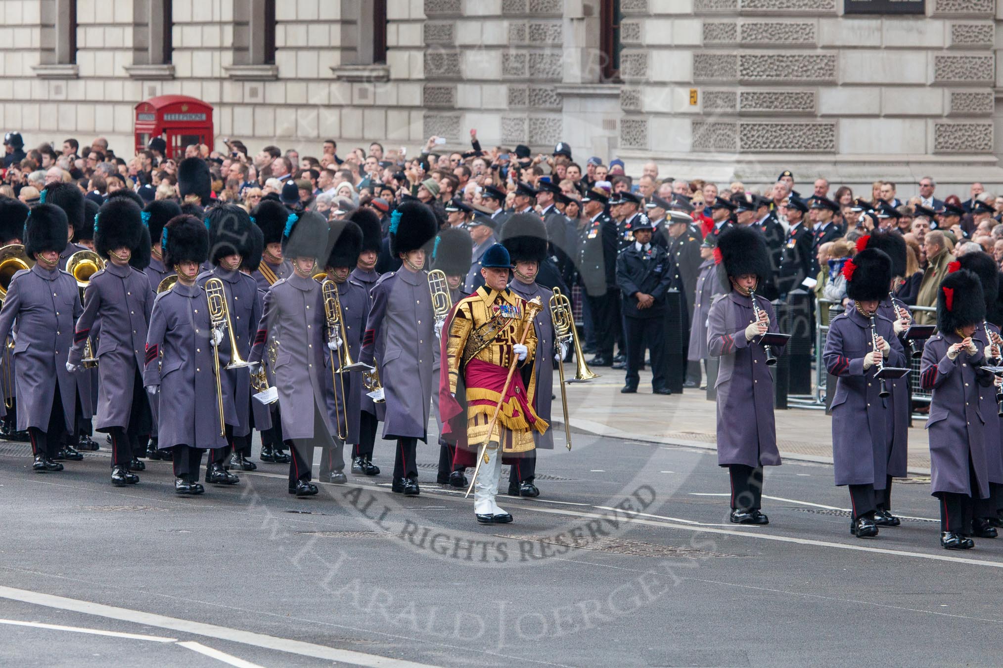 Remembrance Sunday at the Cenotaph in London 2014: Drum Major Neill Lawman, Welsh Guards, leading the band of the Irish Guards onto Whitehall.
Press stand opposite the Foreign Office building, Whitehall, London SW1,
London,
Greater London,
United Kingdom,
on 09 November 2014 at 10:24, image #59
