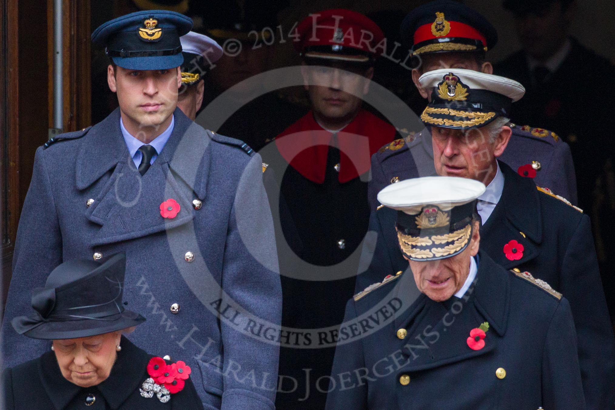 Remembrance Sunday at the Cenotaph in London 2014: Members of the Royal Family emerging from the Foreign- and Commonwealth Office - HM The Queen, HM The Duke of Edinburgh, HRH The Duke of Cambridge and HRH The Prince of Wales.
Press stand opposite the Foreign Office building, Whitehall, London SW1,
London,
Greater London,
United Kingdom,
on 09 November 2014 at 10:58, image #142