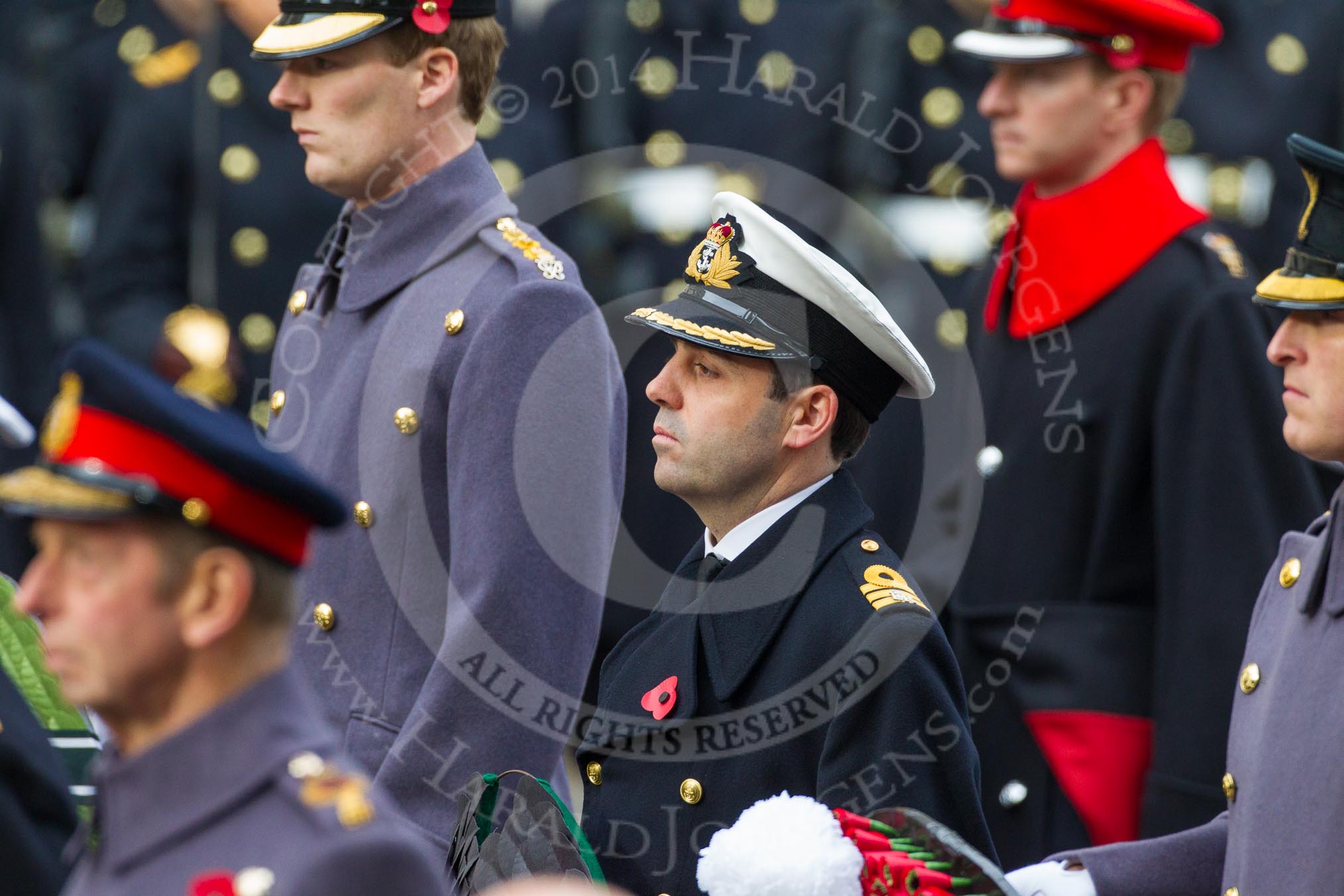Remembrance Sunday at the Cenotaph in London 2014: Commander Andrew Canale, Royal Navy, equerry to HM The Queen.
Press stand opposite the Foreign Office building, Whitehall, London SW1,
London,
Greater London,
United Kingdom,
on 09 November 2014 at 10:59, image #152