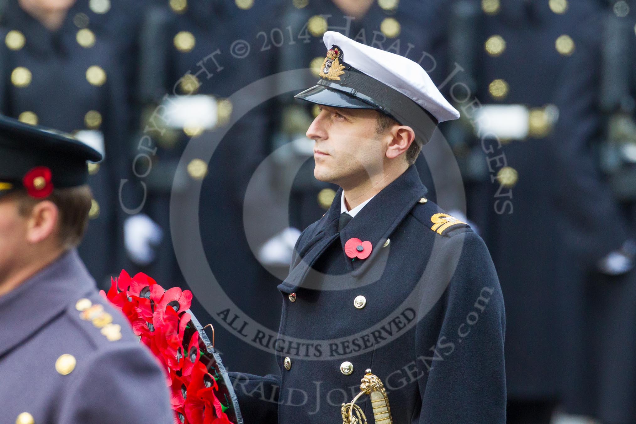 Remembrance Sunday at the Cenotaph in London 2014: Lieutenant Jack Cooper, Royal Navy, equerry to HRH The Duke of York.
Press stand opposite the Foreign Office building, Whitehall, London SW1,
London,
Greater London,
United Kingdom,
on 09 November 2014 at 10:59, image #154