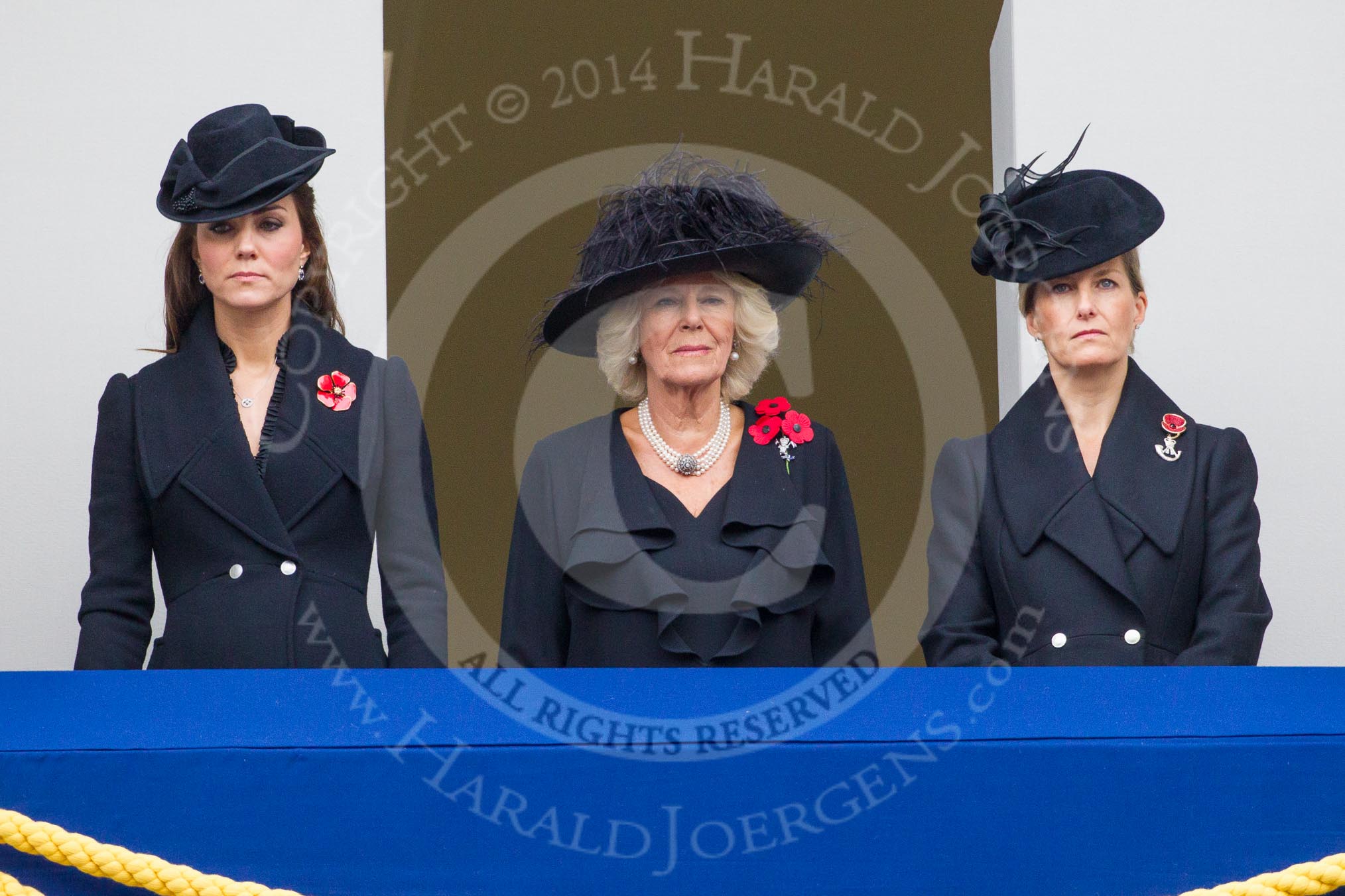 Remembrance Sunday at the Cenotaph in London 2014: TRH The Duchess of Cambridge, TRH The Duchess of Cornwall, and TRH The Countess of Wessex on the balcony of the Foreign- and Commonwealth Office.
Press stand opposite the Foreign Office building, Whitehall, London SW1,
London,
Greater London,
United Kingdom,
on 09 November 2014 at 11:02, image #159