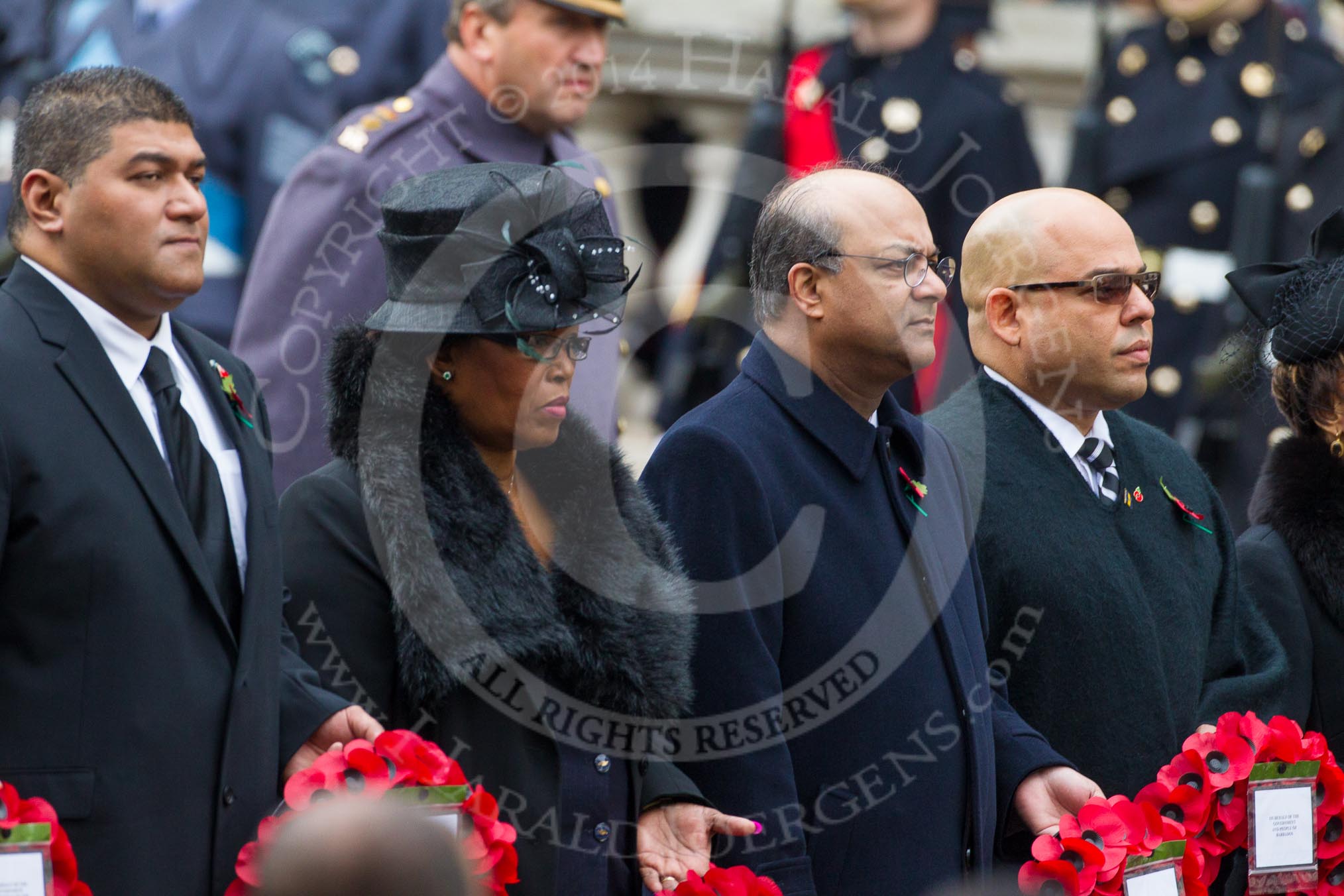 Remembrance Sunday at the Cenotaph in London 2014: The High Commissioner of Tonga, the High Commissioner of Swaziland, the High Commissioner of Mauritius and the High Commissioner of Barbados with their wreaths at the Cenotaph.
Press stand opposite the Foreign Office building, Whitehall, London SW1,
London,
Greater London,
United Kingdom,
on 09 November 2014 at 11:03, image #177