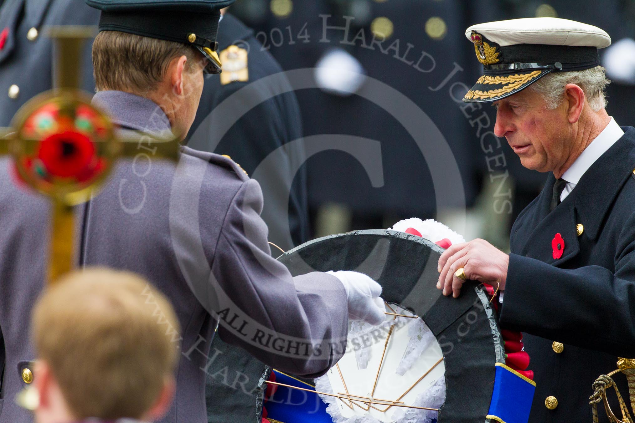 Remembrance Sunday at the Cenotaph in London 2014: Lieutenant Colonel David Bevan, Equerry to HRH The Prince of Wales, handing over the wreath to Prince Charles.
Press stand opposite the Foreign Office building, Whitehall, London SW1,
London,
Greater London,
United Kingdom,
on 09 November 2014 at 11:04, image #194