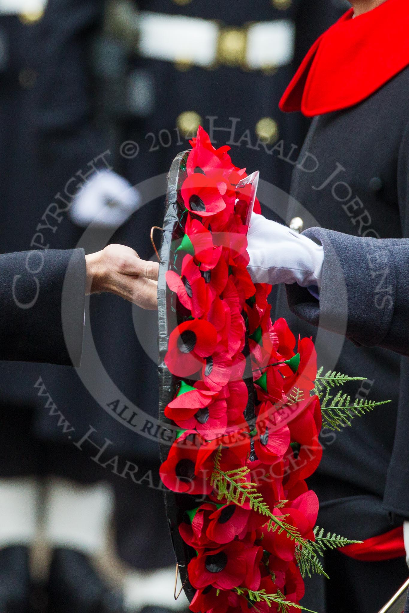 Remembrance Sunday at the Cenotaph in London 2014: The handing over of a wreath - Lieutenant James Benbow, Royal Navy, and HRH The Duke of Cambridge.
Press stand opposite the Foreign Office building, Whitehall, London SW1,
London,
Greater London,
United Kingdom,
on 09 November 2014 at 11:05, image #202