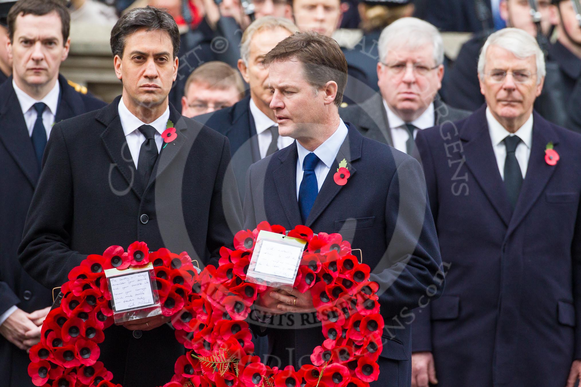 Remembrance Sunday at the Cenotaph in London 2014: Nick Clegg, as leader of the Liberal Democrats, walking towards the Cenotaph with his wreath.
Press stand opposite the Foreign Office building, Whitehall, London SW1,
London,
Greater London,
United Kingdom,
on 09 November 2014 at 11:07, image #222