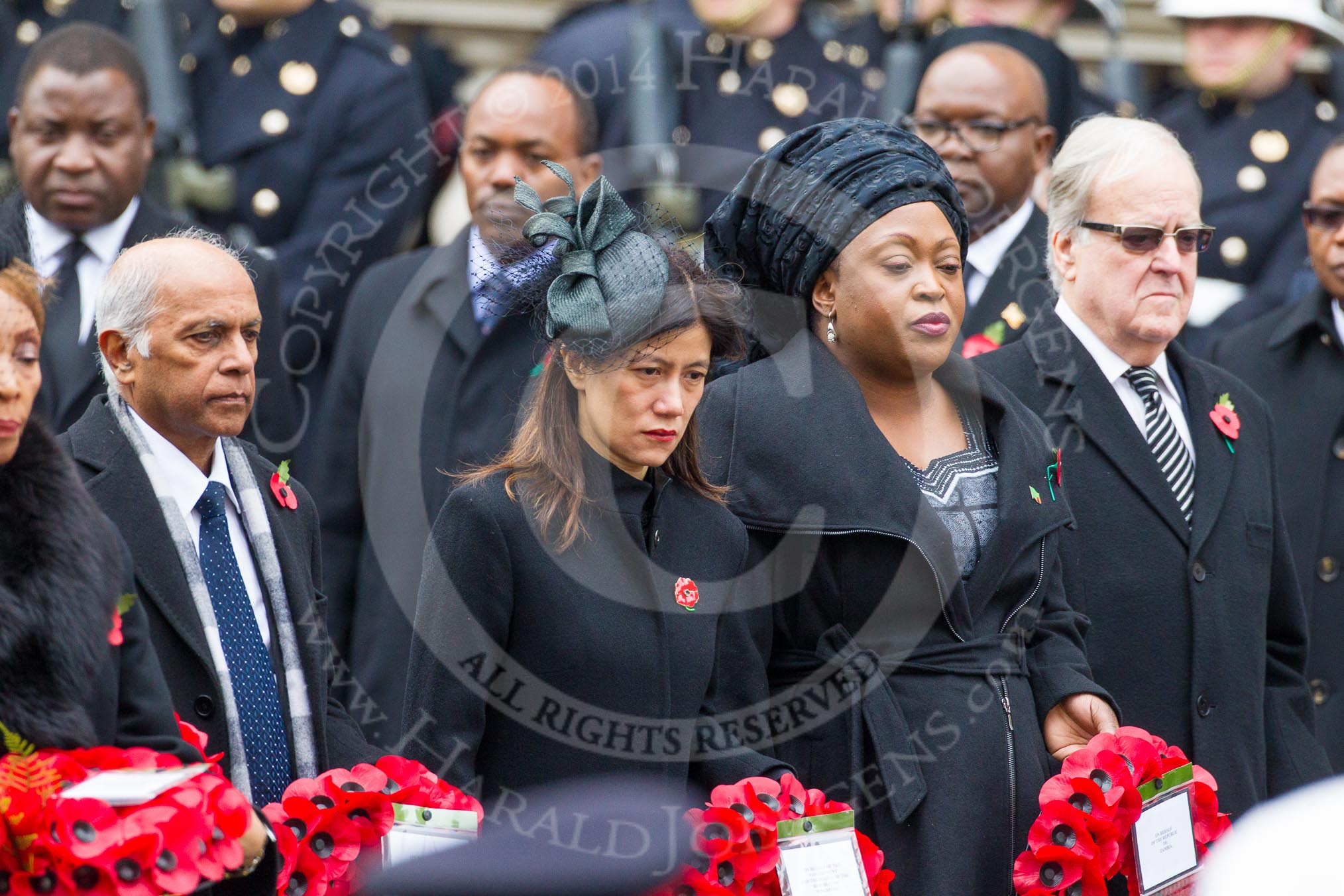 Remembrance Sunday at the Cenotaph in London 2014: The High Commissioner of Guyana, the High Commissioner of Singapore, the High Commissioner of Zambia and and the High Commissioner of Malta with their wreaths at the Cenotaph.
Press stand opposite the Foreign Office building, Whitehall, London SW1,
London,
Greater London,
United Kingdom,
on 09 November 2014 at 11:11, image #247
