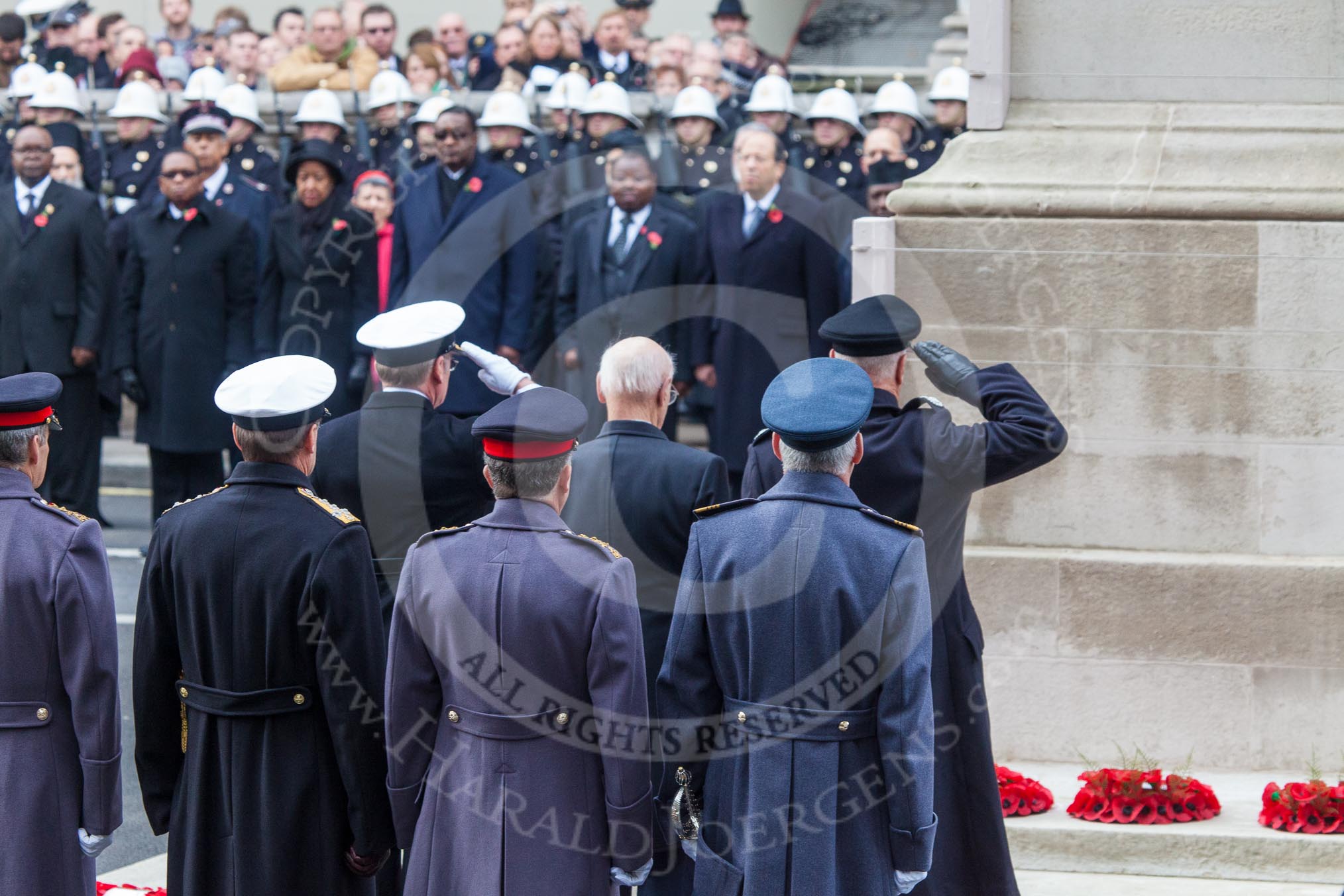 Remembrance Sunday at the Cenotaph in London 2014: Captain Ian McNaught as representative of the Merchant Navy and Fishing Fleets, Mr Martin R Nicholson for the Air Transport Auxiliary Association , and Peter Holland, HM Government’s Chief Fire and Rescue Advisor, after laying their wreaths at the Cenotaph.
Press stand opposite the Foreign Office building, Whitehall, London SW1,
London,
Greater London,
United Kingdom,
on 09 November 2014 at 11:15, image #261
