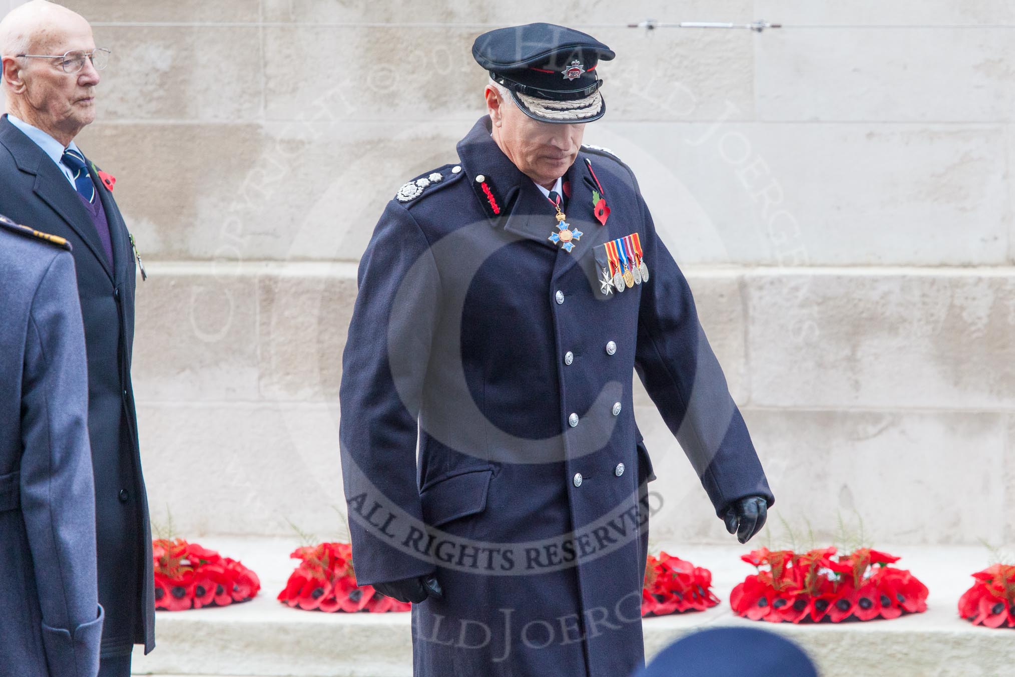 Remembrance Sunday at the Cenotaph in London 2014: Mr Martin R Nicholson for the Air Transport Auxiliary Association , and Peter Holland, HM Government’s Chief Fire and Rescue Advisor, after laying their wreaths at the Cenotaph.
Press stand opposite the Foreign Office building, Whitehall, London SW1,
London,
Greater London,
United Kingdom,
on 09 November 2014 at 11:15, image #262