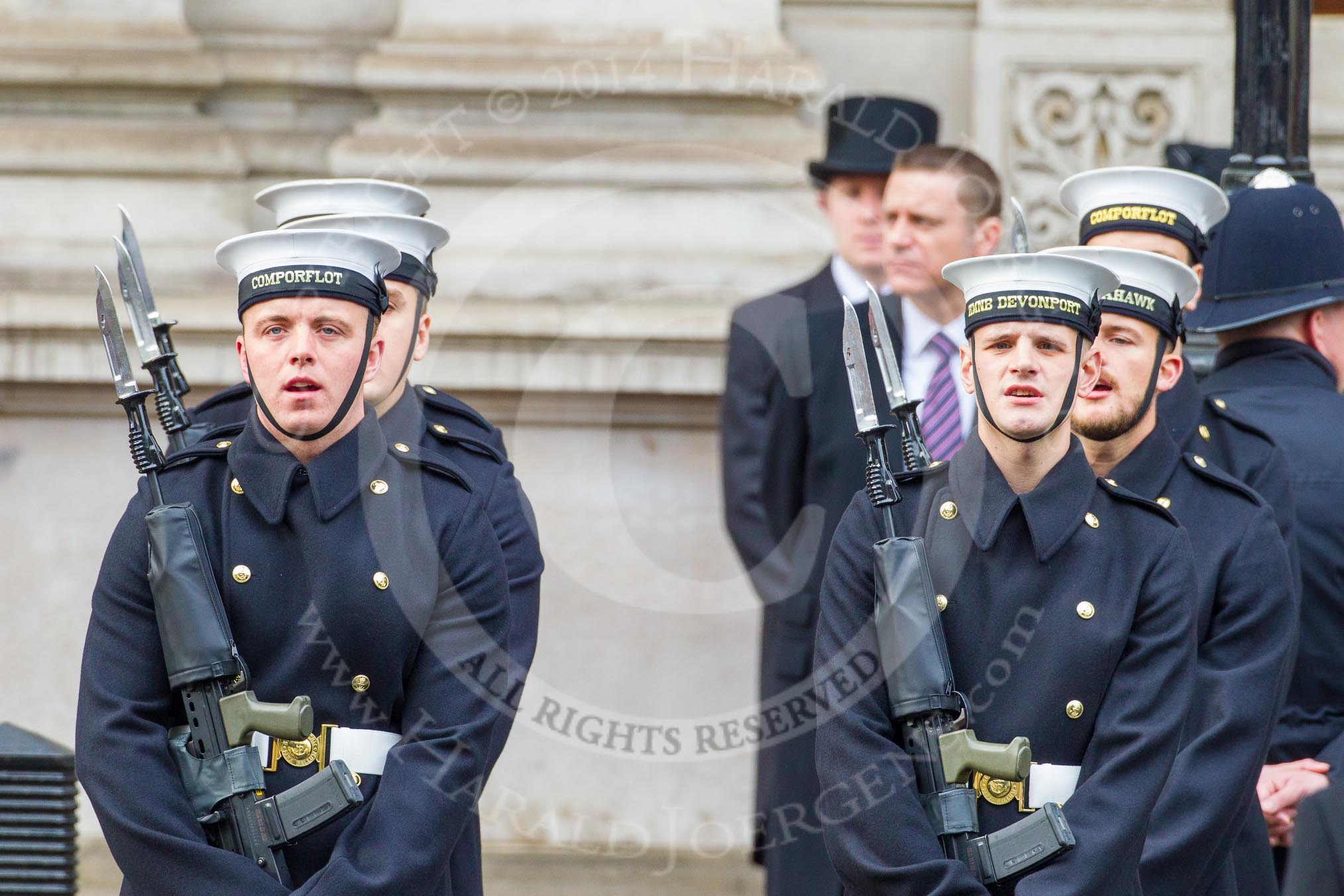 Remembrance Sunday at the Cenotaph in London 2014: Members of the Royal Navy detachment singing during the service.
Press stand opposite the Foreign Office building, Whitehall, London SW1,
London,
Greater London,
United Kingdom,
on 09 November 2014 at 11:17, image #282